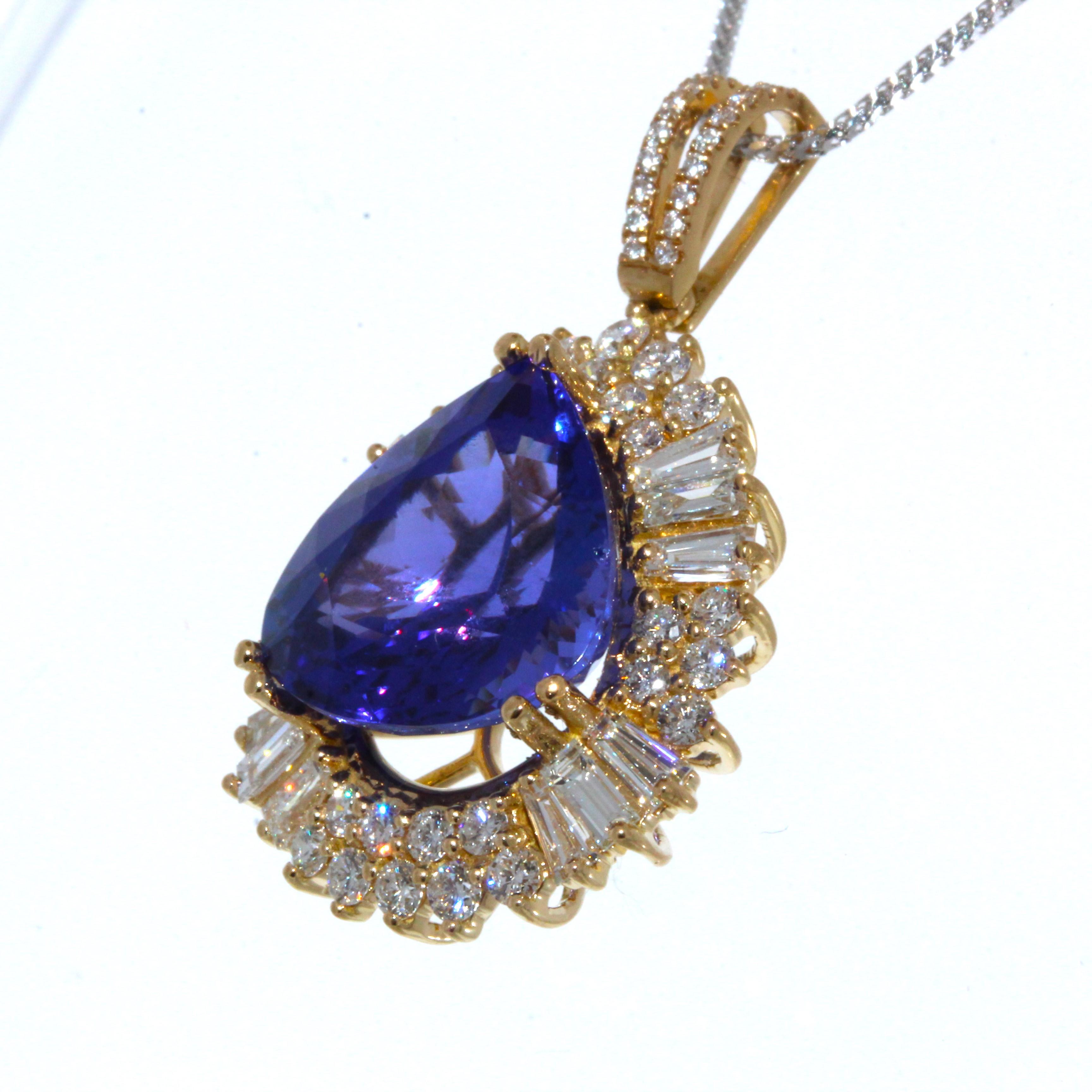 This lavish brightly polished 18 karat yellow gold smooth Pear shaped cocktail Pendant presents one hand selected fine quality Pear cut 9.38 CT tanzanite prong set in the center, originating from Tanzania with a beautiful color saturation. A total