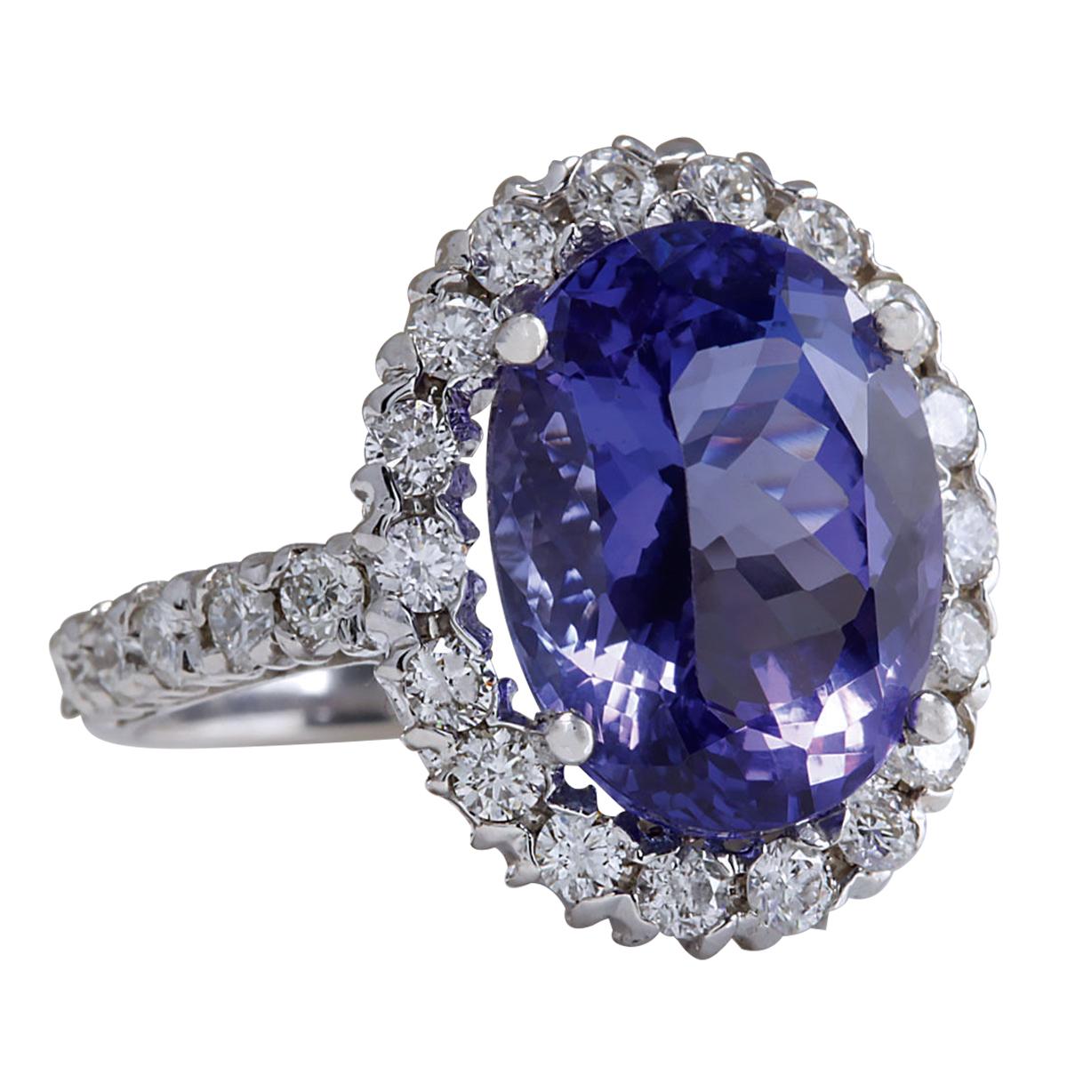 Introducing our exquisite 14 Karat White Gold Diamond Ring showcasing a magnificent 9.39 Carat Tanzanite, stamped with authenticity. Crafted with precision, this ring exudes elegance and sophistication. Weighing 5.5 grams, it features a captivating