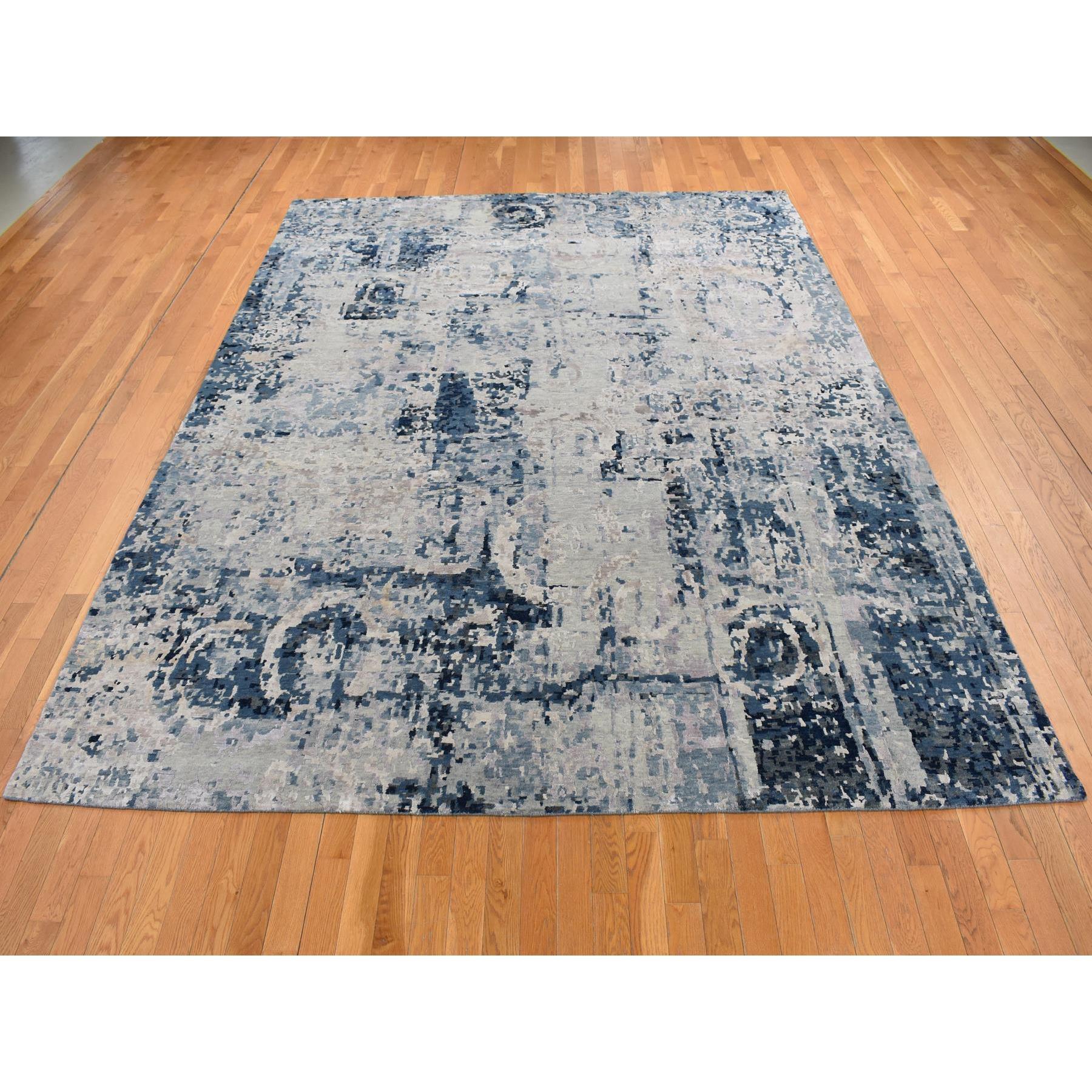 Gris arsénico, anudada a mano, diseño de círculos rotos y borrados, lana y seda, pelo alto, alfombra oriental
Materiales primarios: Lana y seda
Látex: Sin pelo 
altura: 0,25 Pulgadas
Estilo: Transicional
Color principal: Gris
Colores secundarios: