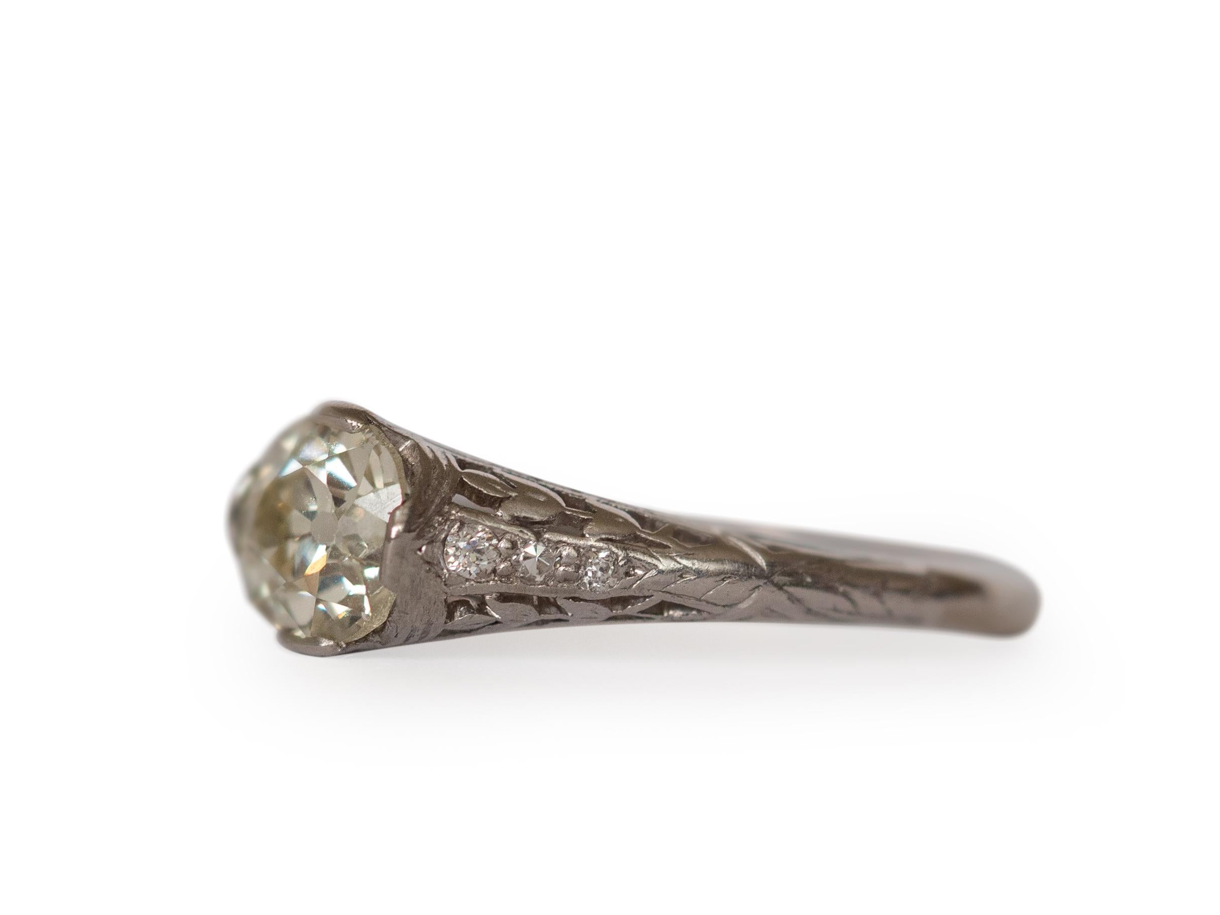 Item Details: 
Ring Size: 6.5
Metal Type: Platinum [Hallmarked, and Tested]
Weight: 3 grams

Center Diamond Details:
Weight: .94 Carat
Cut: Antique Cushion
Color: M-N
Clarity: SI1

Finger to Top of Stone Measurement: mm
Condition: Excellent