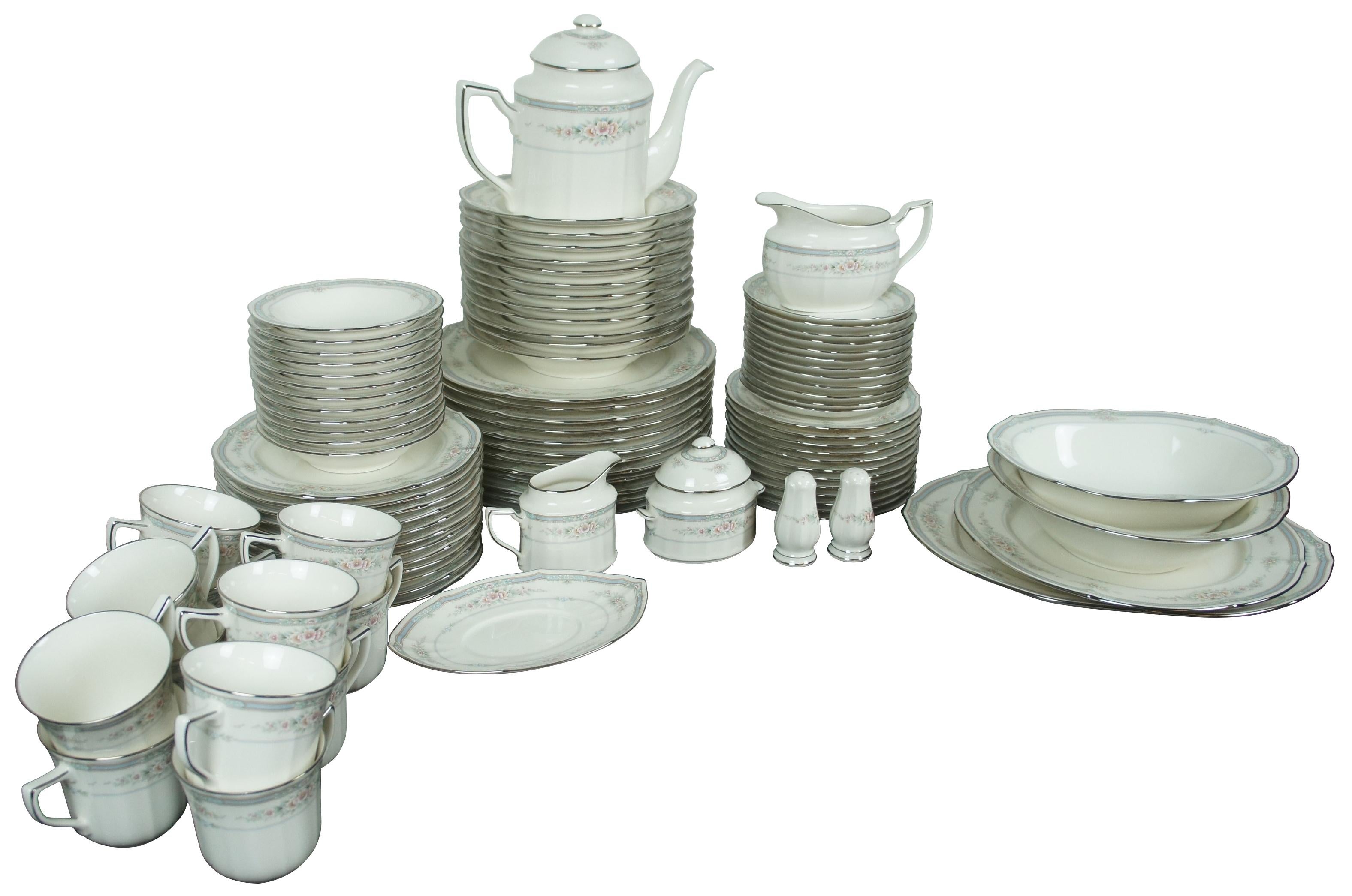 94 piece china set by Noritake in the Rothschild floral pattern with teapot, creamer, sugar bowl, shakers, gravy boat, serving bowls, platter, plates, teacups and saucers. 7293, Japan. Service for 12

Measures: Serving plate- 11.25