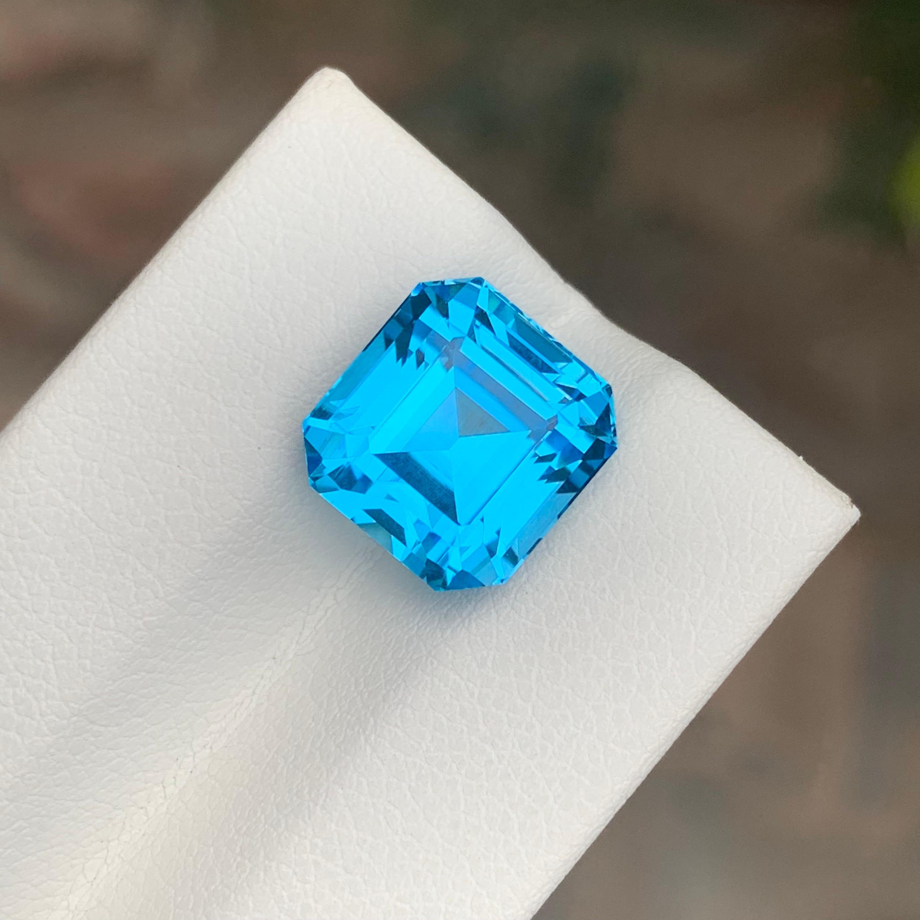 Women's or Men's 9.40 Carat Natural Loose Swiss Blue Topaz Octagon Shape Gemstone For Sale