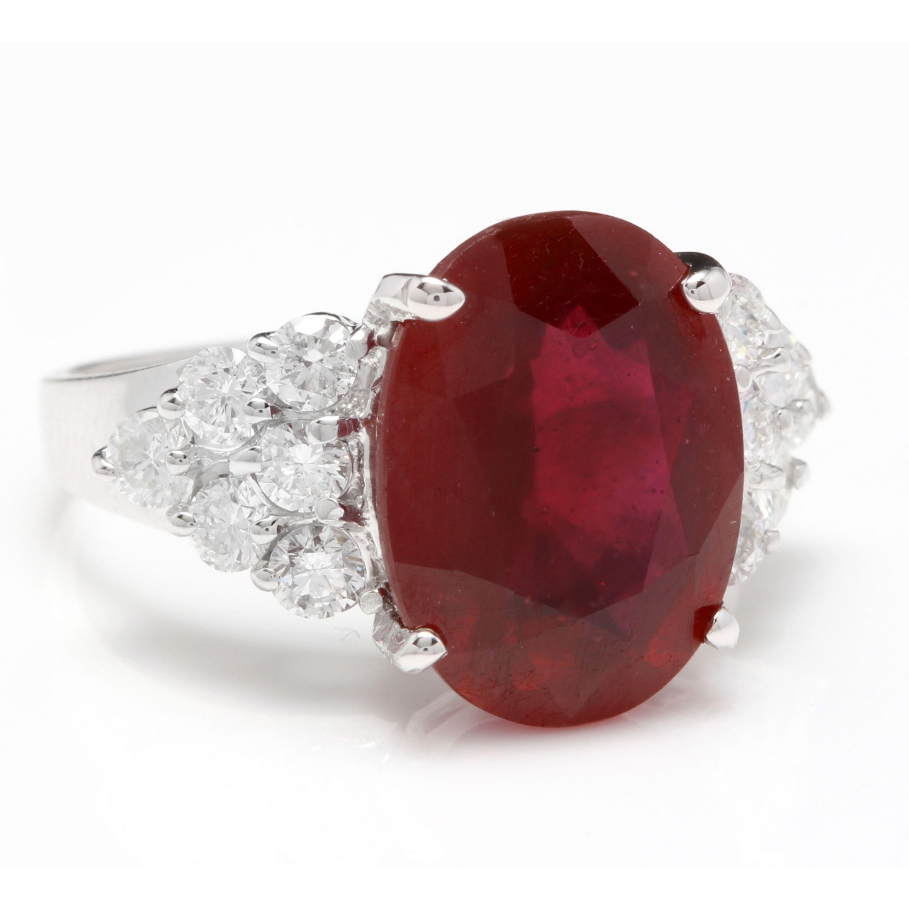 9.40 Carats Impressive Red Ruby and Natural Diamond 14K White Gold Ring

Total Red Ruby Weight is: Approx. 8.50 Carats

Ruby Treatment: Lead Glass Filling

Ruby Measures: Approx. Approx. 13.65 x 10.00mm

Natural Round Diamonds Weight: Approx. 0.90