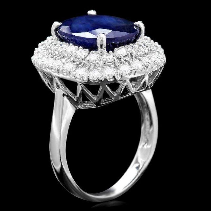 9.40 Carats Natural Blue Sapphire and Diamond 14K Solid White Gold Ring

Total Blue Sapphire Weight is: Approx. 7.90 Carats

Natural Sapphire Measures: Approx. 13.00 x 10.00mm

Sapphire treatment: Diffusion

Natural Round Diamonds Weight: Approx.