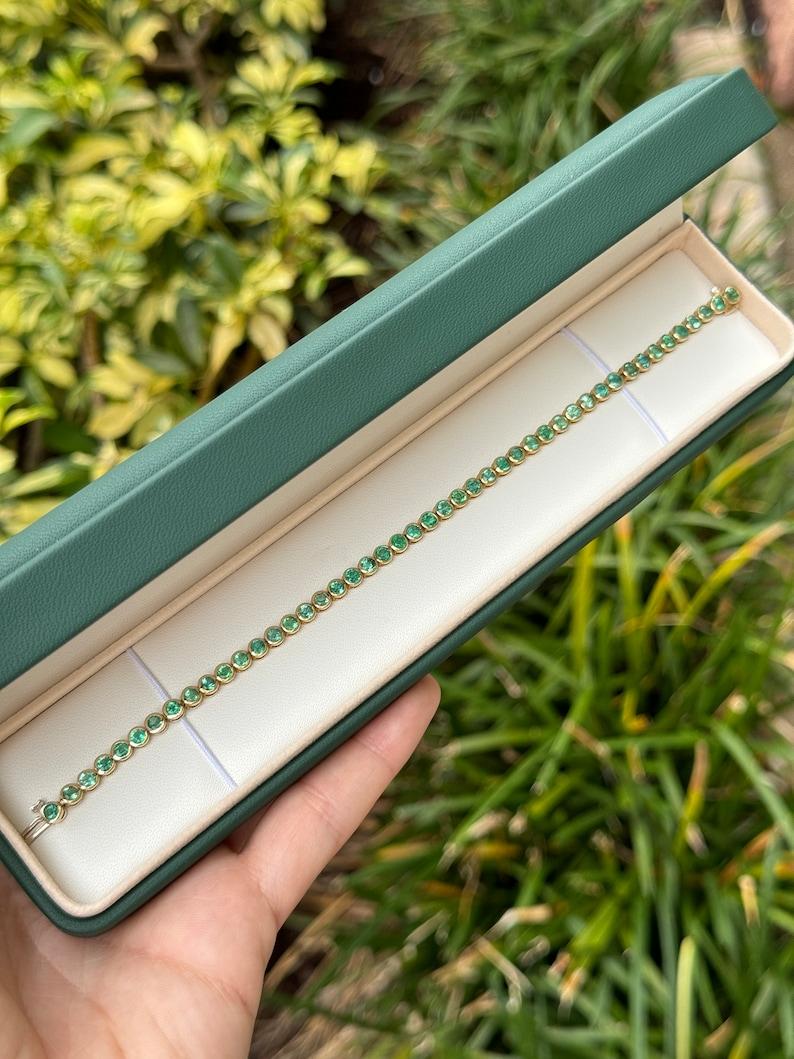 Modern 9.40tcw 14K Gold Emerald Bezel Tennis Bracelet - Unisex Eternity Design For Sale