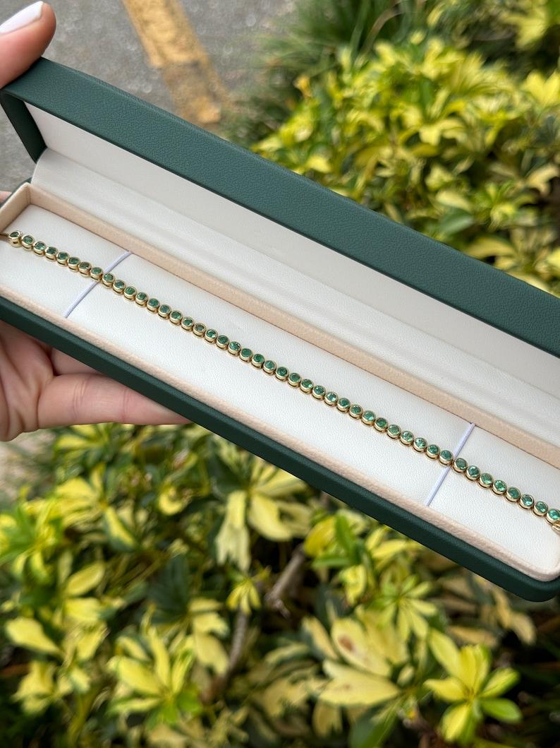 Emerald Cut 9.40tcw 14K Gold Emerald Bezel Tennis Bracelet - Unisex Eternity Design For Sale