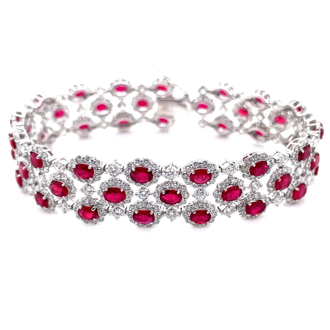 Oval Cut 9.41 Carats Natural Rubies and Diamonds 3 Line Bracelet Set in Platinum