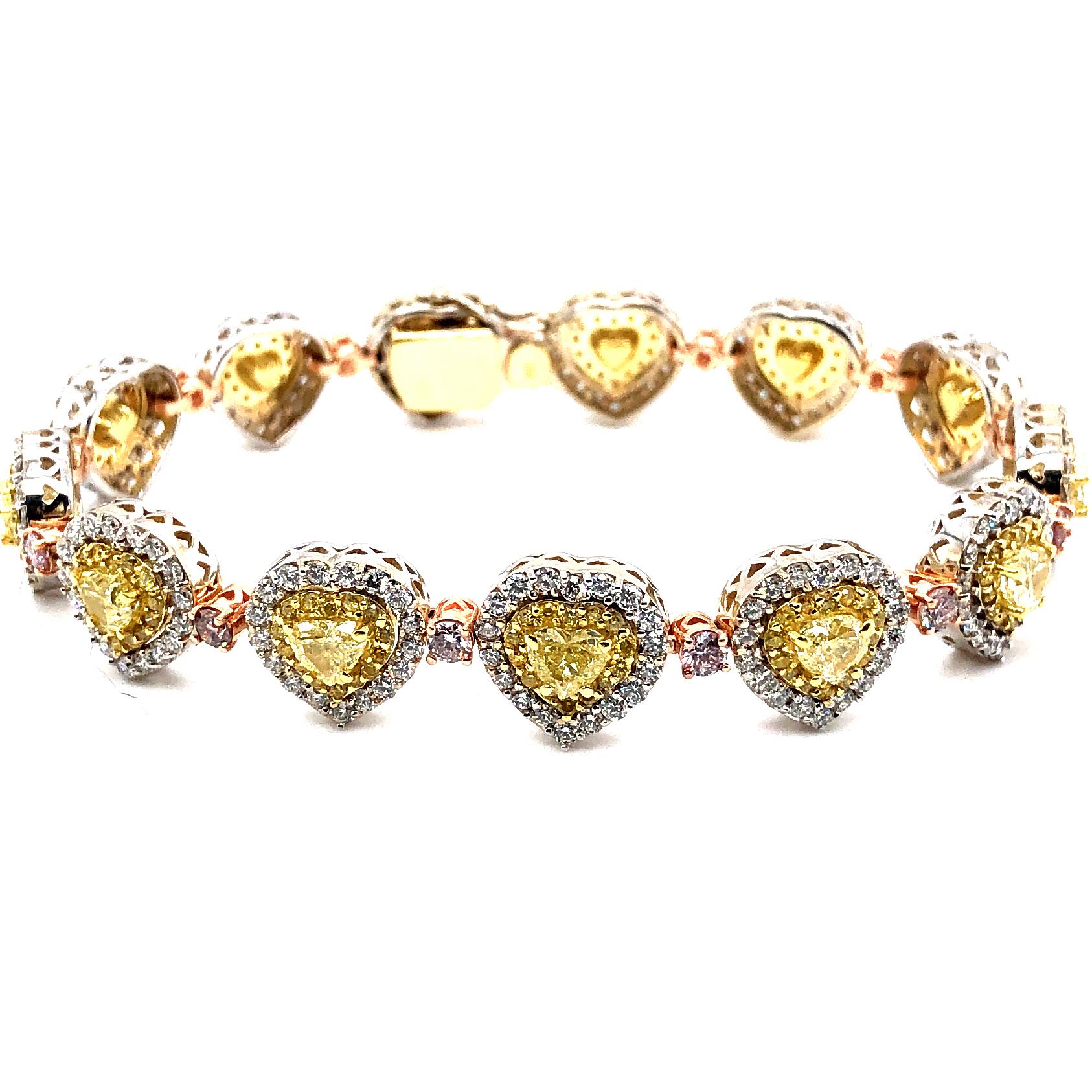 Offered here is a gorgeous three color diamond & gold bracelet. The bracelet is exceptional, it has 13 natural yellow diamonds hearth shaped Vs2-Si1 clarity with an approximate total weight of 3.80 carat, 182 natural yellow round brilliant cut
