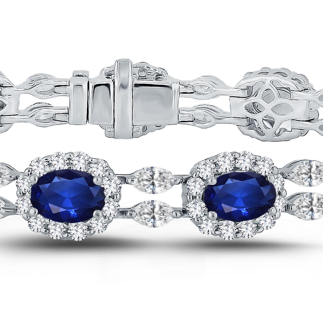Elevate your jewelry collection with this exceptional bracelet, a true embodiment of timeless beauty and sophistication. It features thirteen resplendent oval-cut blue sapphires, collectively weighing 9.42 carats, each delicately framed by a halo of