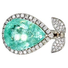Anillo con turmalina Paraíba de color azul-verde neón intenso de 9,42 ct, en oro de 18 quilates, con certificado GIA