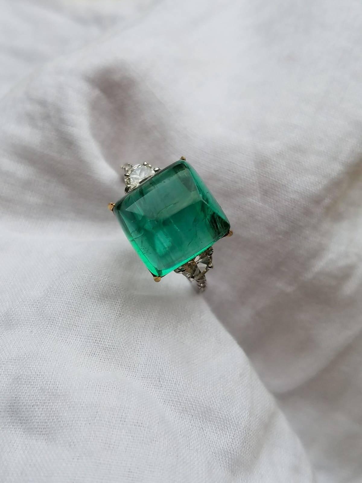 Art Deco 9.43 Carat Sugarloaf Shape Emerald and Diamond Three-Stone Ring