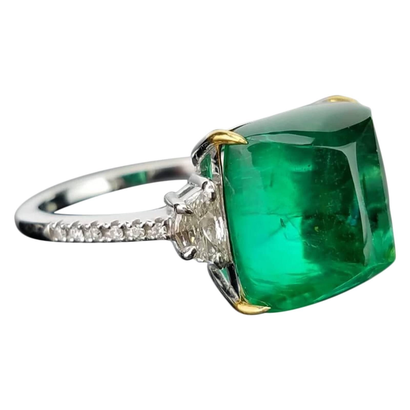 9.43 Carat Sugarloaf Shape Emerald and Diamond Three-Stone Ring