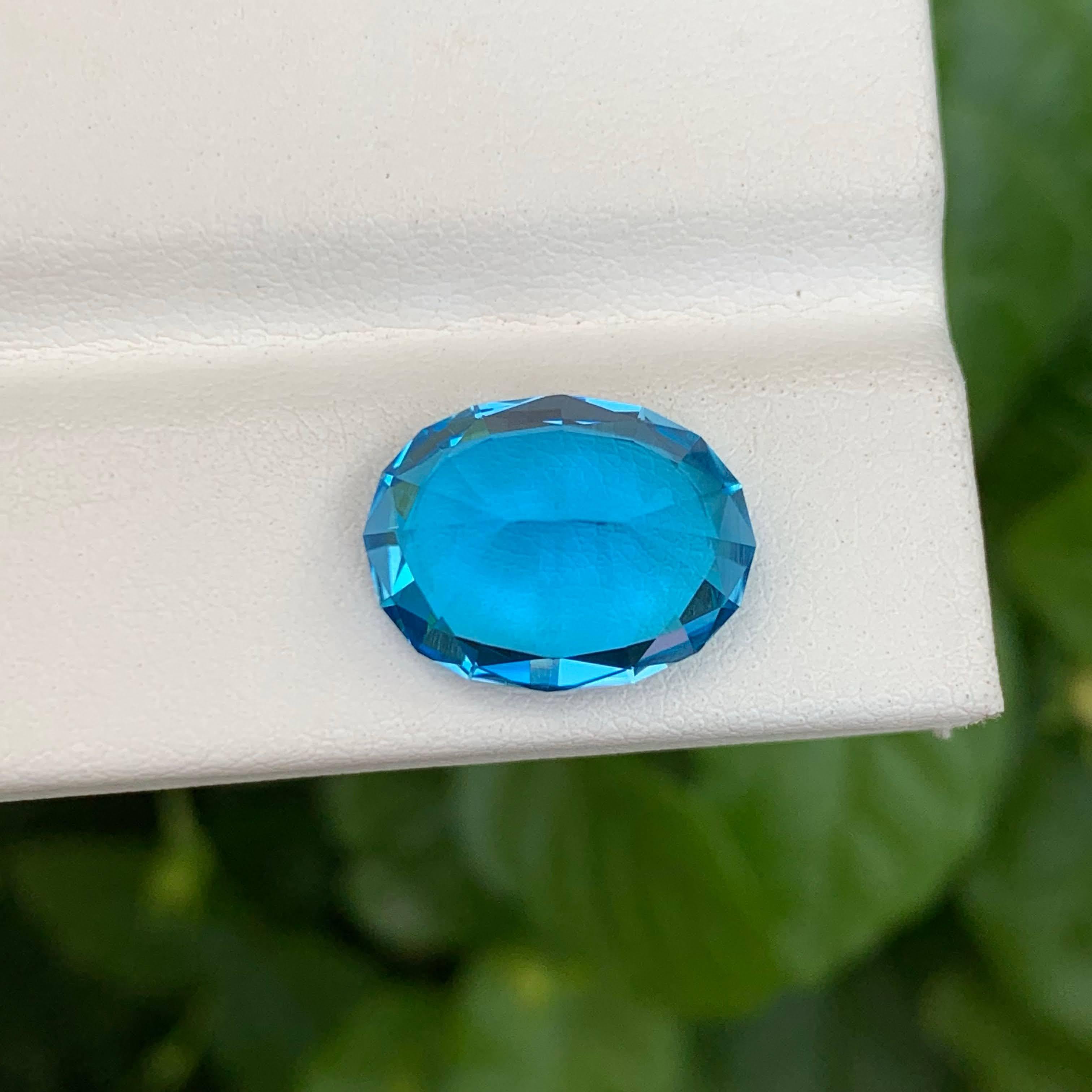 Moderne 9.45 Carat Nature Loose Neon Blue Topaz Stone Oval Cut Brazilian Gemstone (pierre précieuse brésilienne de taille ovale) en vente