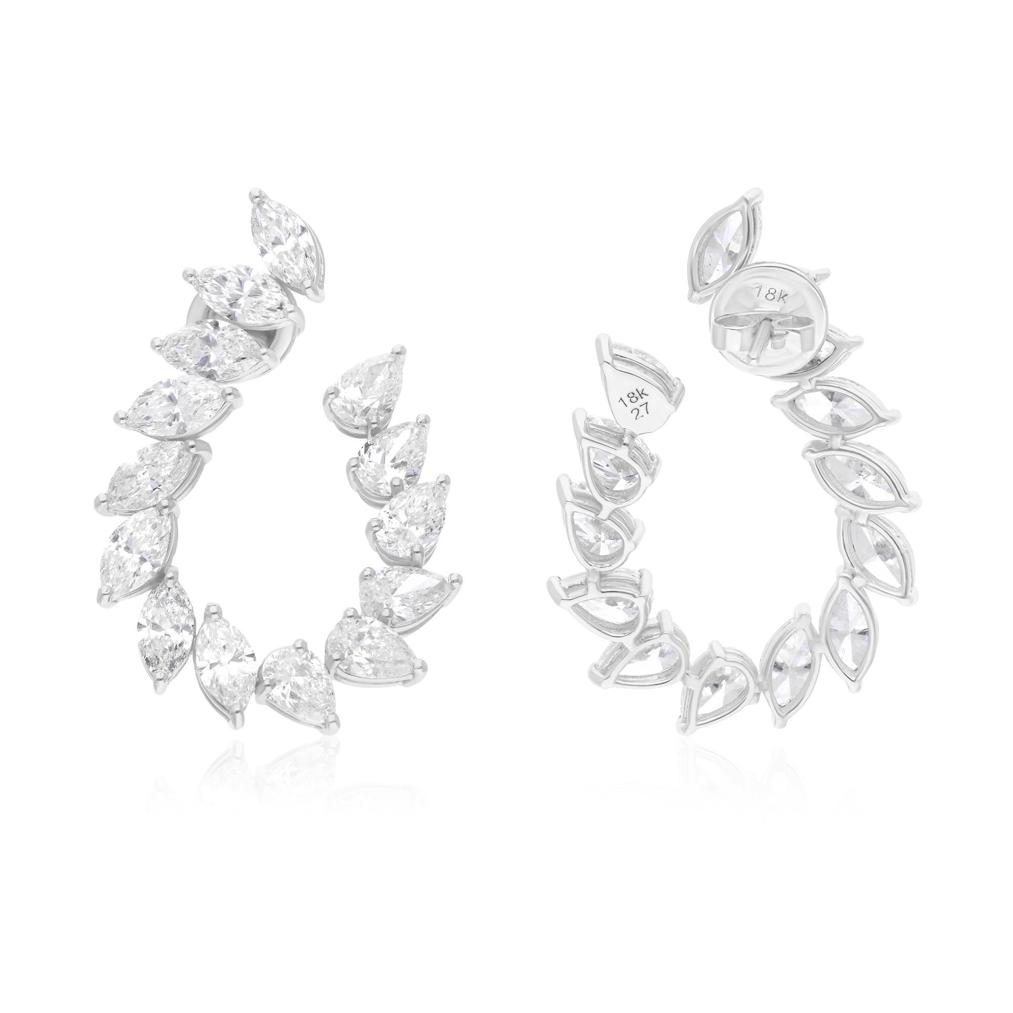 Make a bold statement with these luxurious 9.45 Carat Pear and Marquise Diamond Hoop Earrings, an extraordinary addition to any fine jewelry collection. Crafted from premium 18 Karat White Gold, these earrings showcase a stunning blend of artistry