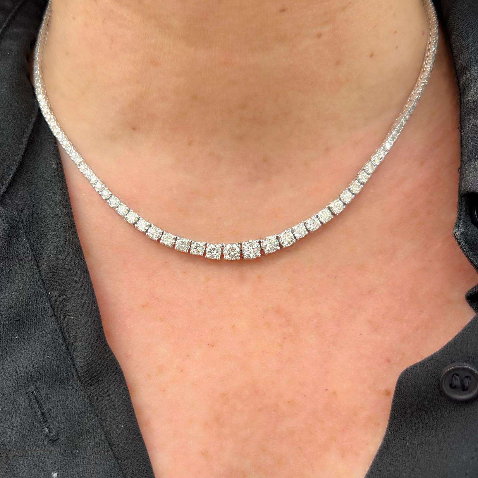 Perhaps the exact diamond line necklace you've been looking for! This 14k white gold stunner features 145 fine round brilliant natural diamonds expertly set in a four-prong style for maximum sparkle. The 145 white diamonds weigh approximately 9.48