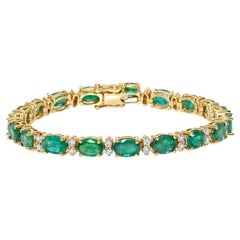 9,48 carati di smeraldo verde ovale e diamanti Bracciale in oro giallo 14 carati Lussuoso ed elegante