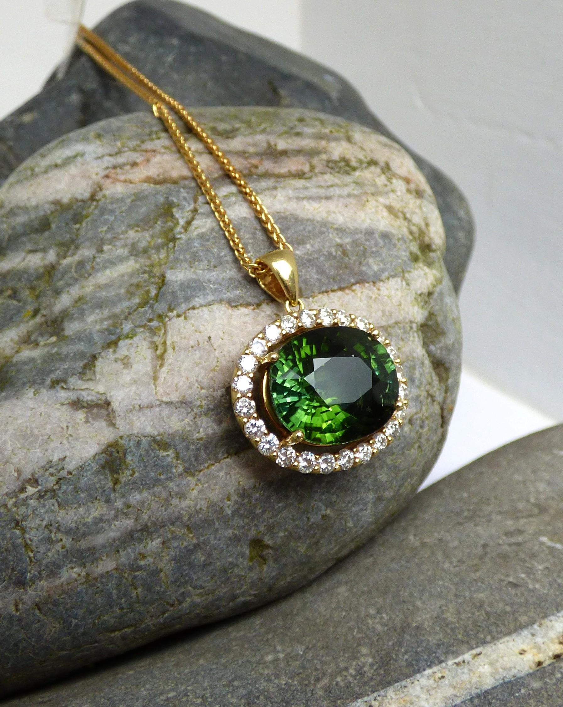 Contemporary 9.48ct Oval cut Green Tourmaline and Diamond Pendant in 18K Gold For Sale