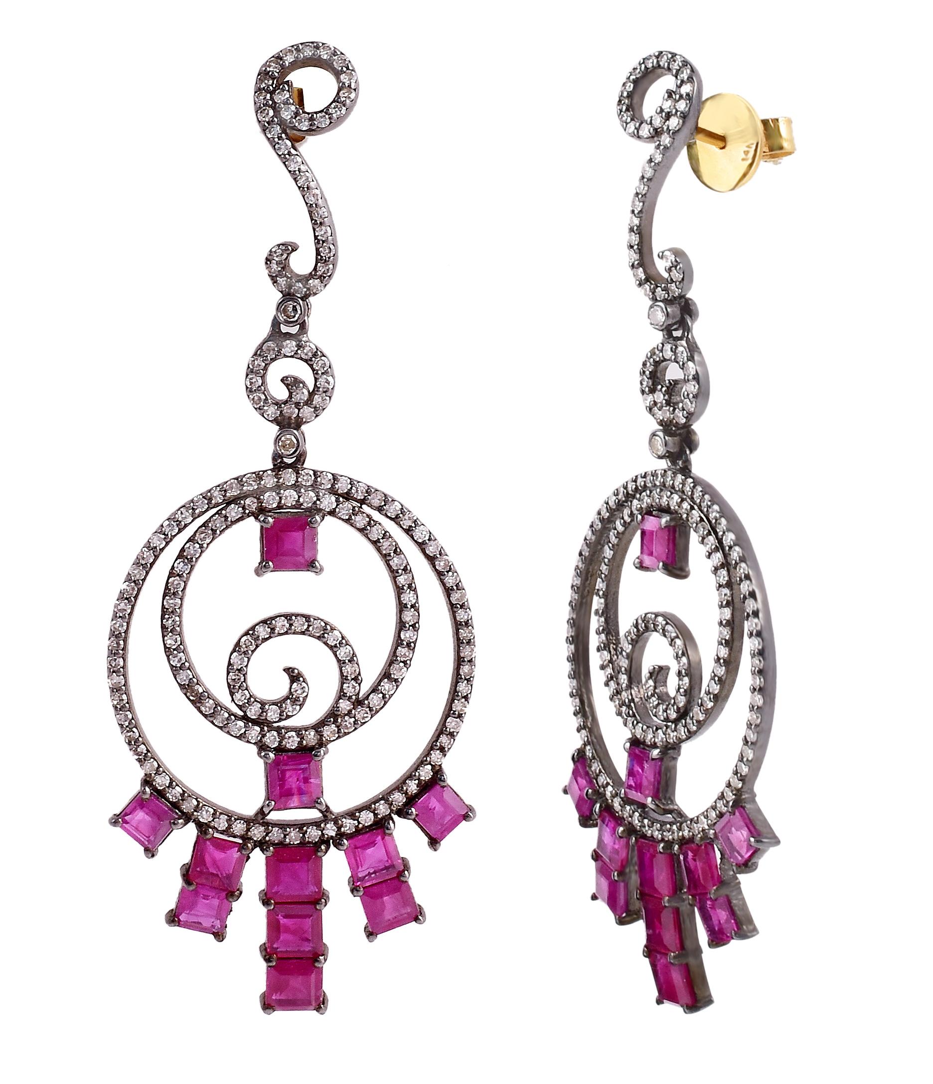 9.49 Carat Diamond and Ruby Victorian Style Drop Earrings

This Victorian style red ruby and diamond long earring is phenomenal. The elegant designer concept of the double round loop with the circles covered with a single row of pave set round