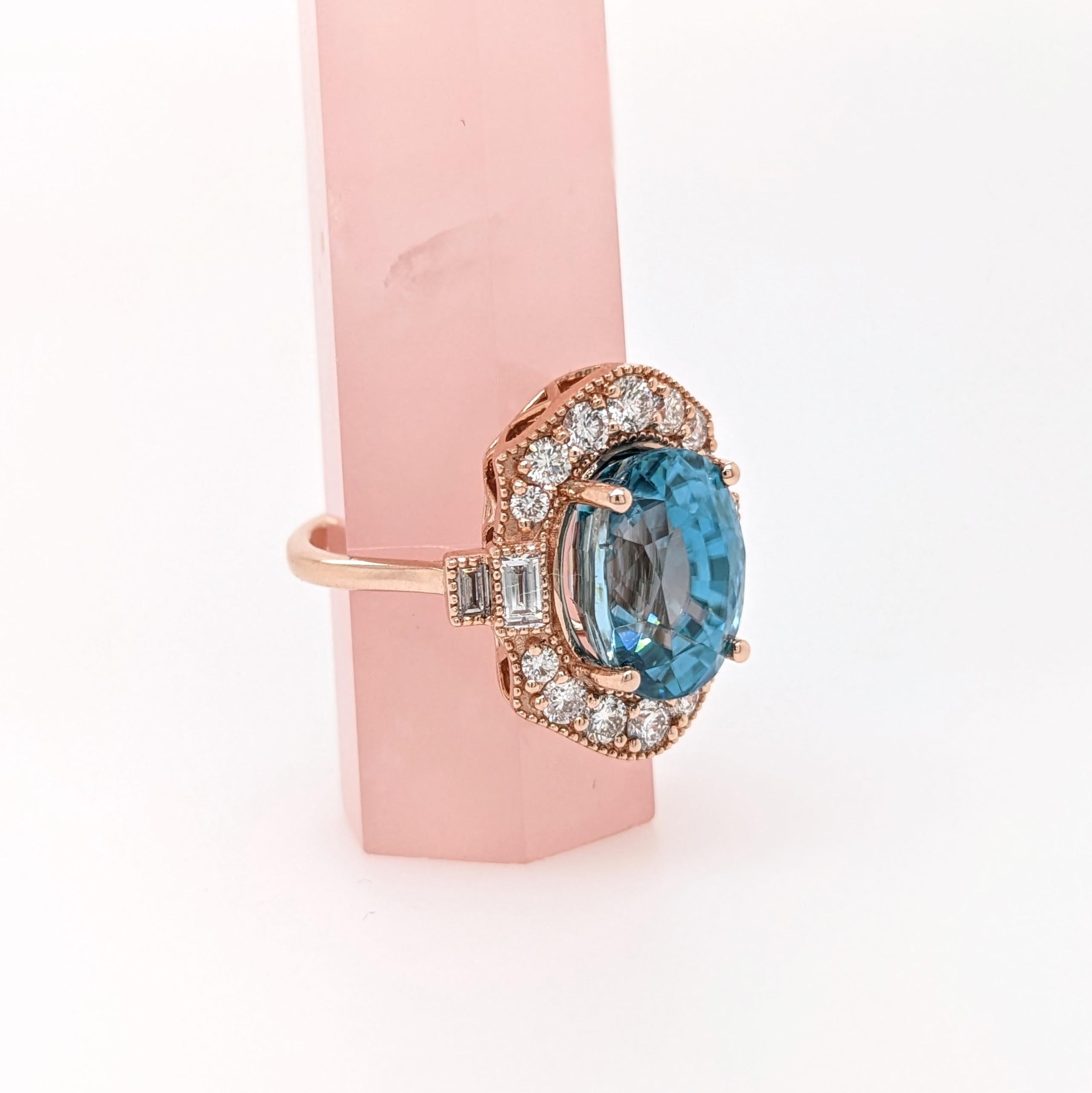Introducing an exquisite blue zircon ring that commands attention with its breathtaking 10 carat center stone, adorned with the brilliance of natural diamond accents. This mesmerizing piece is a true marvel of beauty and sophistication, destined to