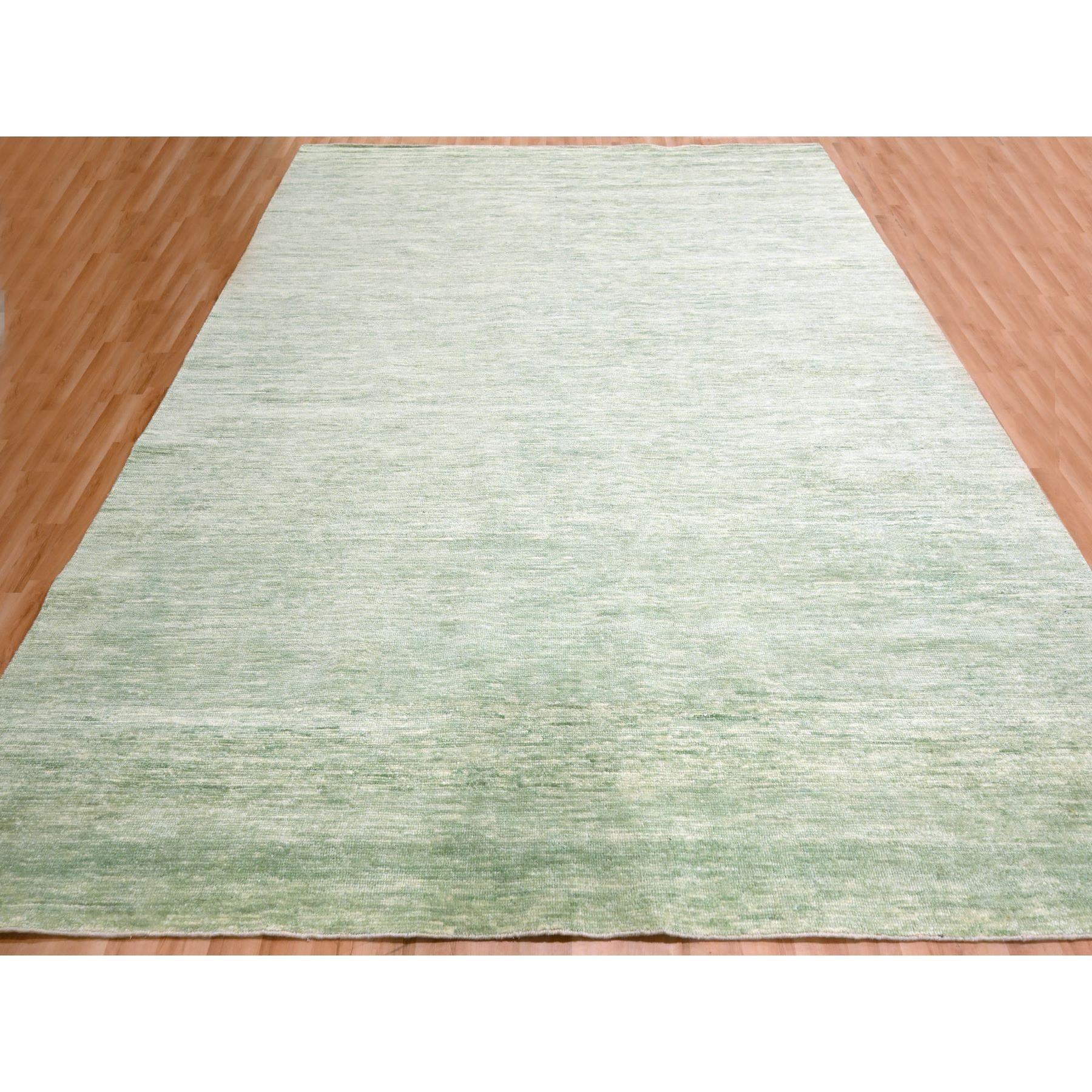 Mist Green, Modern Plain Design, Borderless, Pure Wool, Hand Knotted, Oriental Rug
Primary materials: Wool
Latex: No Pile 
height: 0.25 Inches
Style: Contemporary
Primary color: Green
Secondary colors: None
Pattern: Oriental