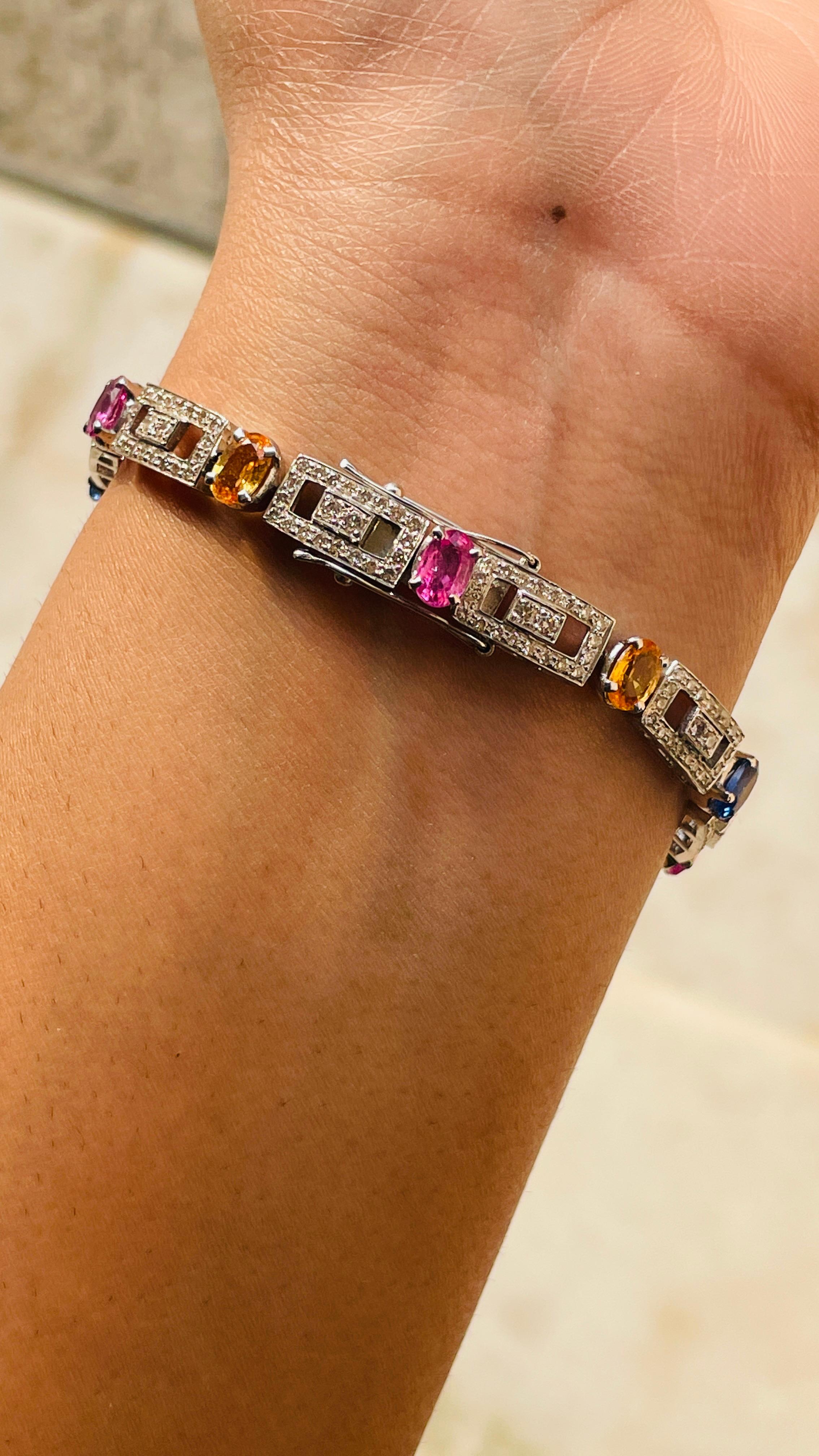 Multi Sapphire bracelet in 18K Gold. It has a perfect oval cut gemstone studded with diamonds to make you stand out on any occasion or an event. 
A tennis bracelet is an essential piece of jewelry when it comes to your wedding day. The sleek and