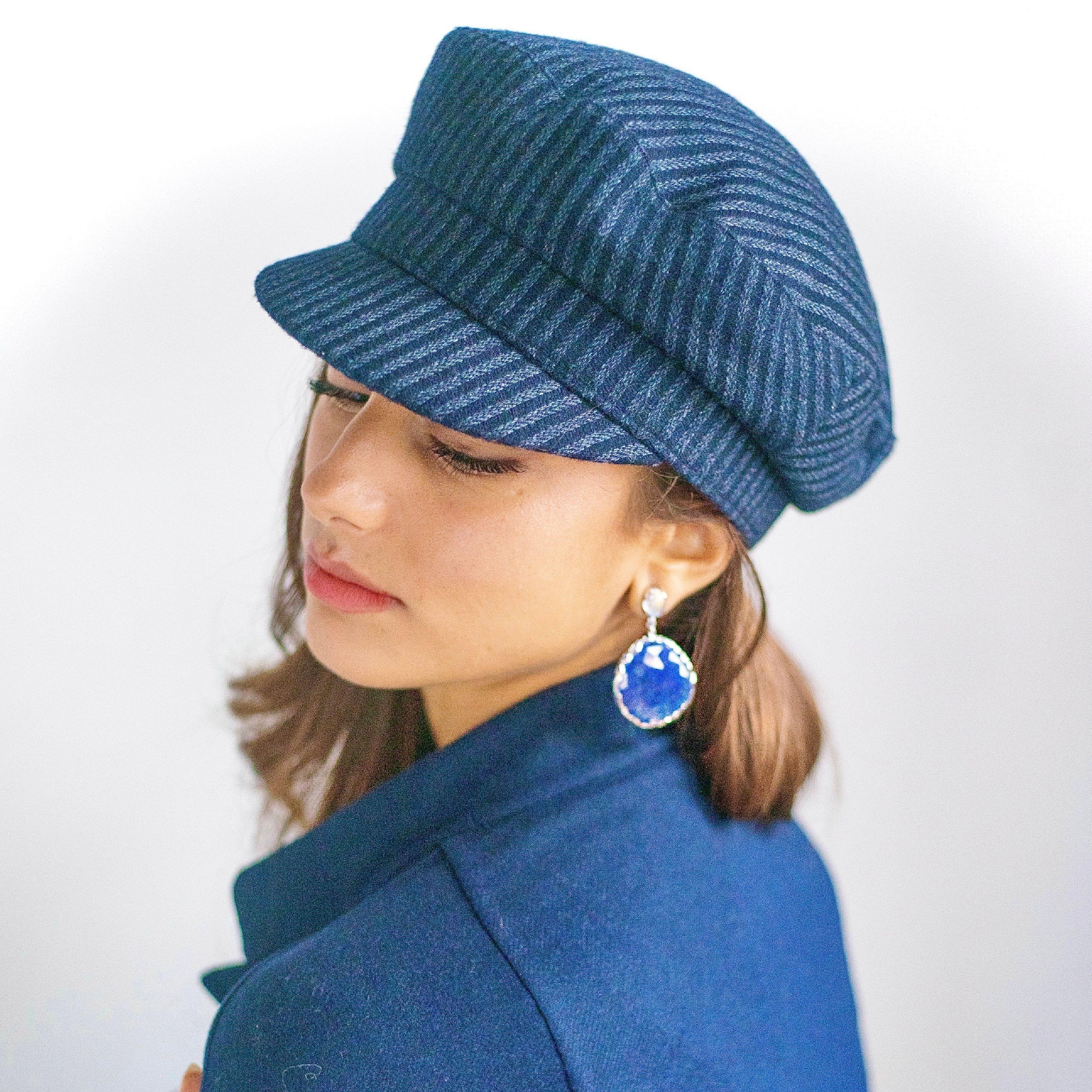 These beautiful 95.6 carats tanzanite rosecuts together with two moonstone cabochons, I made into earrings with irregular 18K whitegold settings. Little irregularities can add a relaxed tone to large gems and make them appear so normal, that they