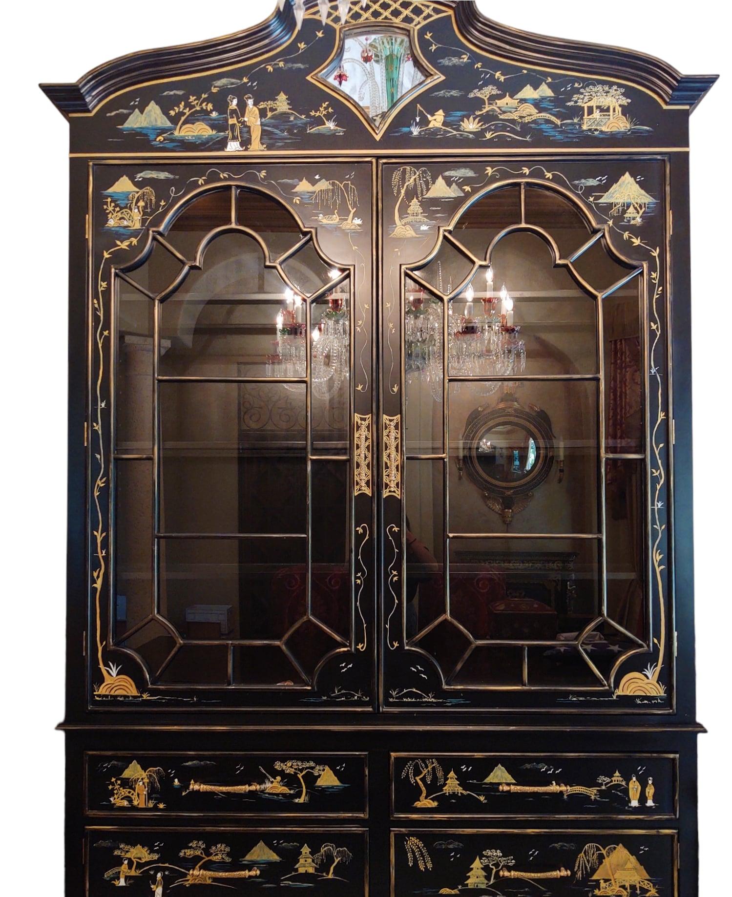 This large-scale custom-built Chinoiserie-style display hutch is of one-piece construction and stands 9.5 feet tall. It has six drop-front drawers for easy access. The upper display part features three glass shelves which make for four display