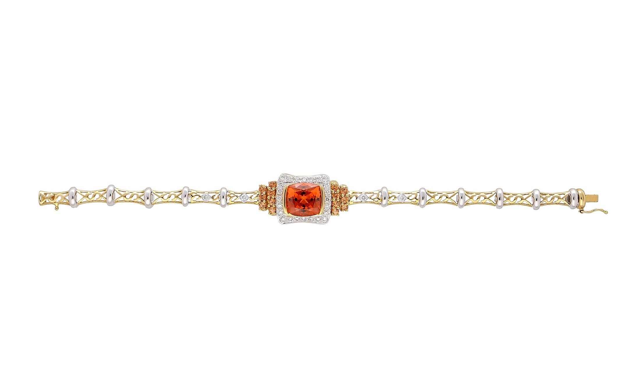 9.50 Carat GIA Certified Spessartine Garnet and Diamond Bracelet, a marvel in 18 karat two-tone gold. Adorned with a meticulously carved floral pattern, it boasts a captivating cushion-cut Spessartine Garnet, radiating a fiery, vivid orange hue that