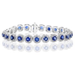 Bracelet tennis en or blanc 14 carats avec saphirs bleus ronds de 9,50 carats et halo de diamants