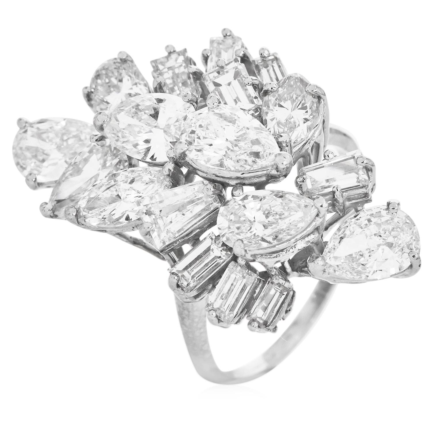 This stunning estate natural diamond cluster cocktail ring is crafted in platinum. this sparkling ring is set with eight pear-cut diamonds, one marquise-shape, and eight baguette-cut diamond H-I color, VS and SI1 clarity, prong set. The total