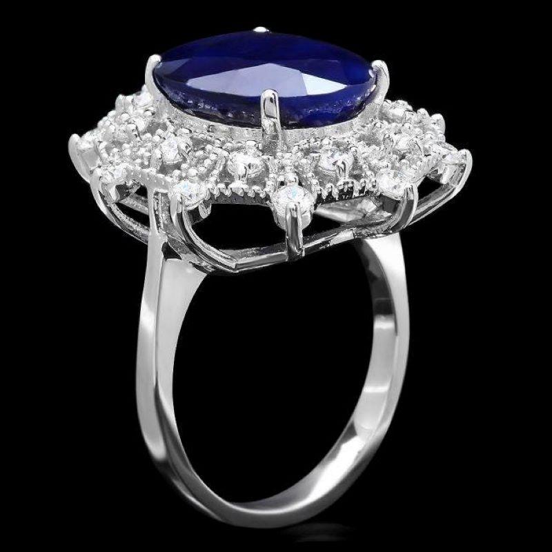 9.50 Carats Natural Blue Sapphire and Diamond 14K Solid White Gold Ring

Total Blue Sapphire Weight is: Approx. 8.80 Carats

Natural Sapphire Measures: Approx. 13.00 x 11.00mm

Sapphire treatment: Diffusion

Natural Round Diamonds Weight: Approx.