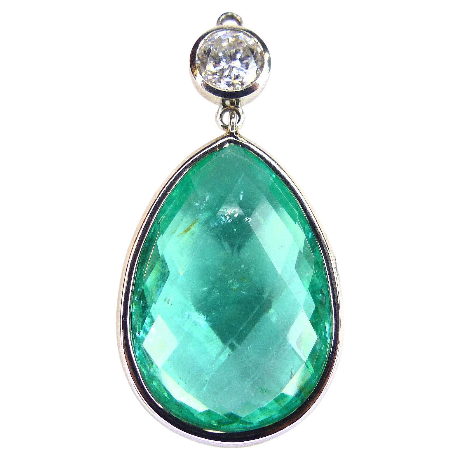 Pendant in Platinum with 1 blue/green Paraiba Tourmaline Briolett and 1 Diamond. For Sale