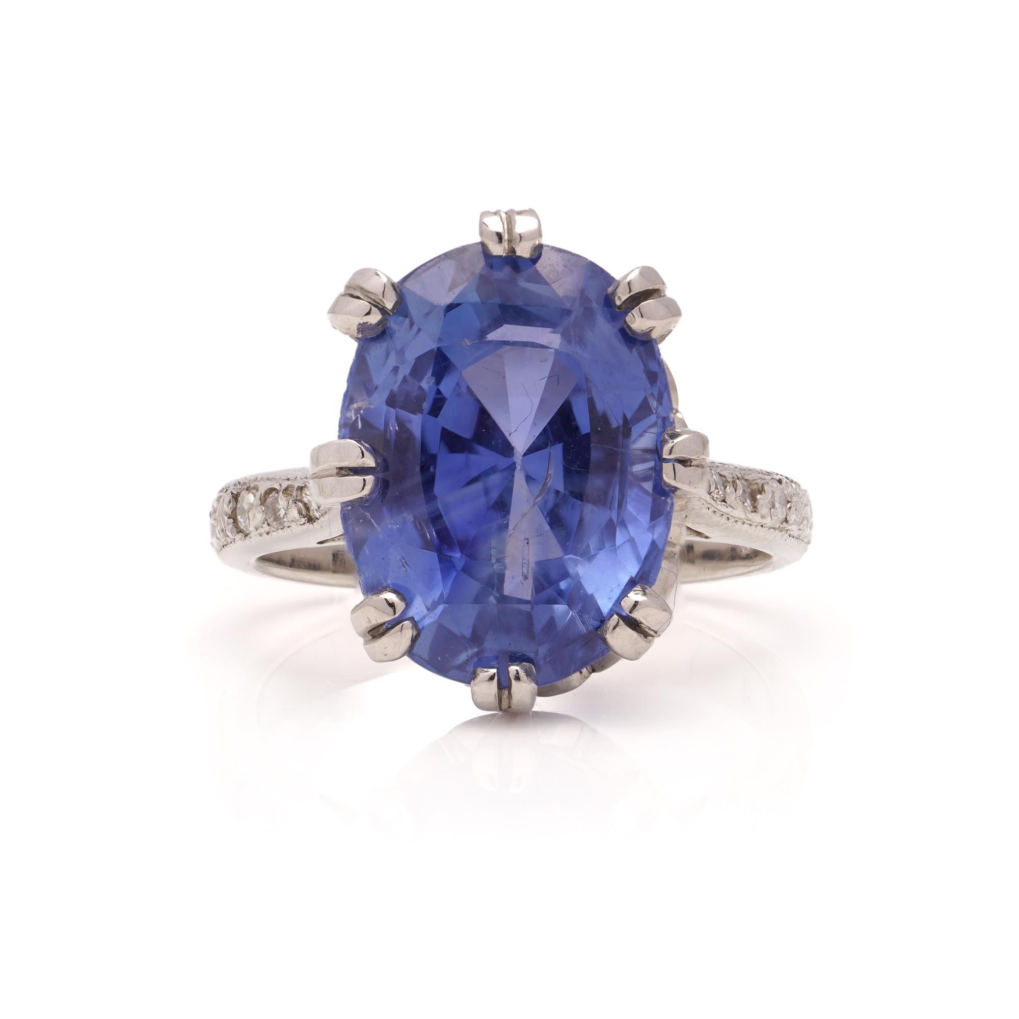 950 Platinum 5.50 carats of oval faceted sapphire and diamond ring. 
Hallmarked with Platinum mark. 

Dimensions -
Finger Size (UK) = K 1/2 ( EU) = 52.5 (US) = 5.75 
Weight: 9.00 grams

Diamonds -
Cut: Round brilliant 
Quantity: 6 
Carat weight: