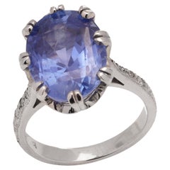 950 Platinum 5.50 carats of oval faceted sapphire and diamond ring