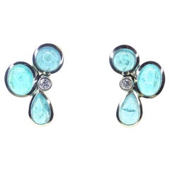 Earrings in Platinum with 6 Paraiba Tourmaline Cabouchons and 2 Diamonds