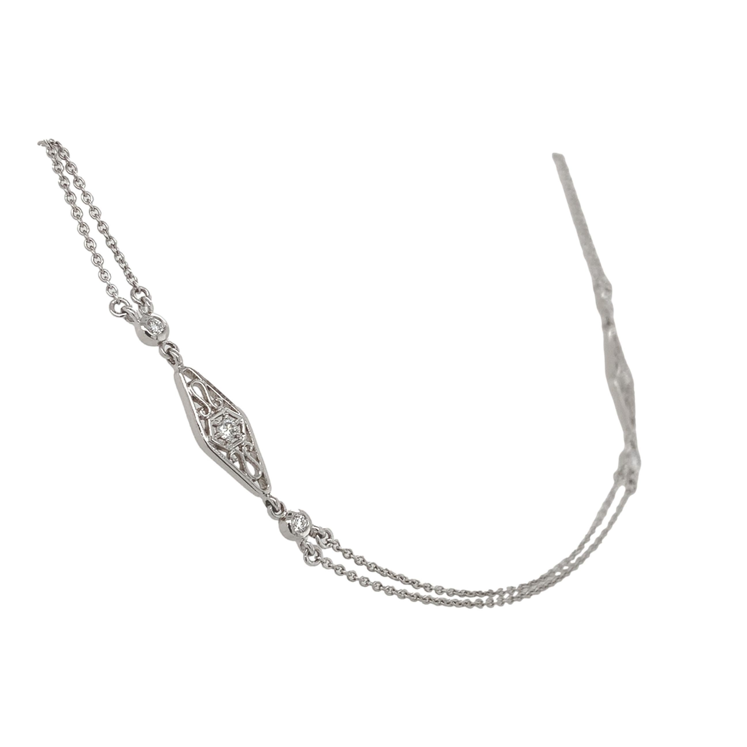 Chaîne double en platine 950 de style Art déco avec des maillons filigranés en diamants. La chaîne personnalisée comporte 6 maillons allongés en filigrane moulé avec des diamants et 10 maillons sertis de diamants. Il y a un total de 16 véritables