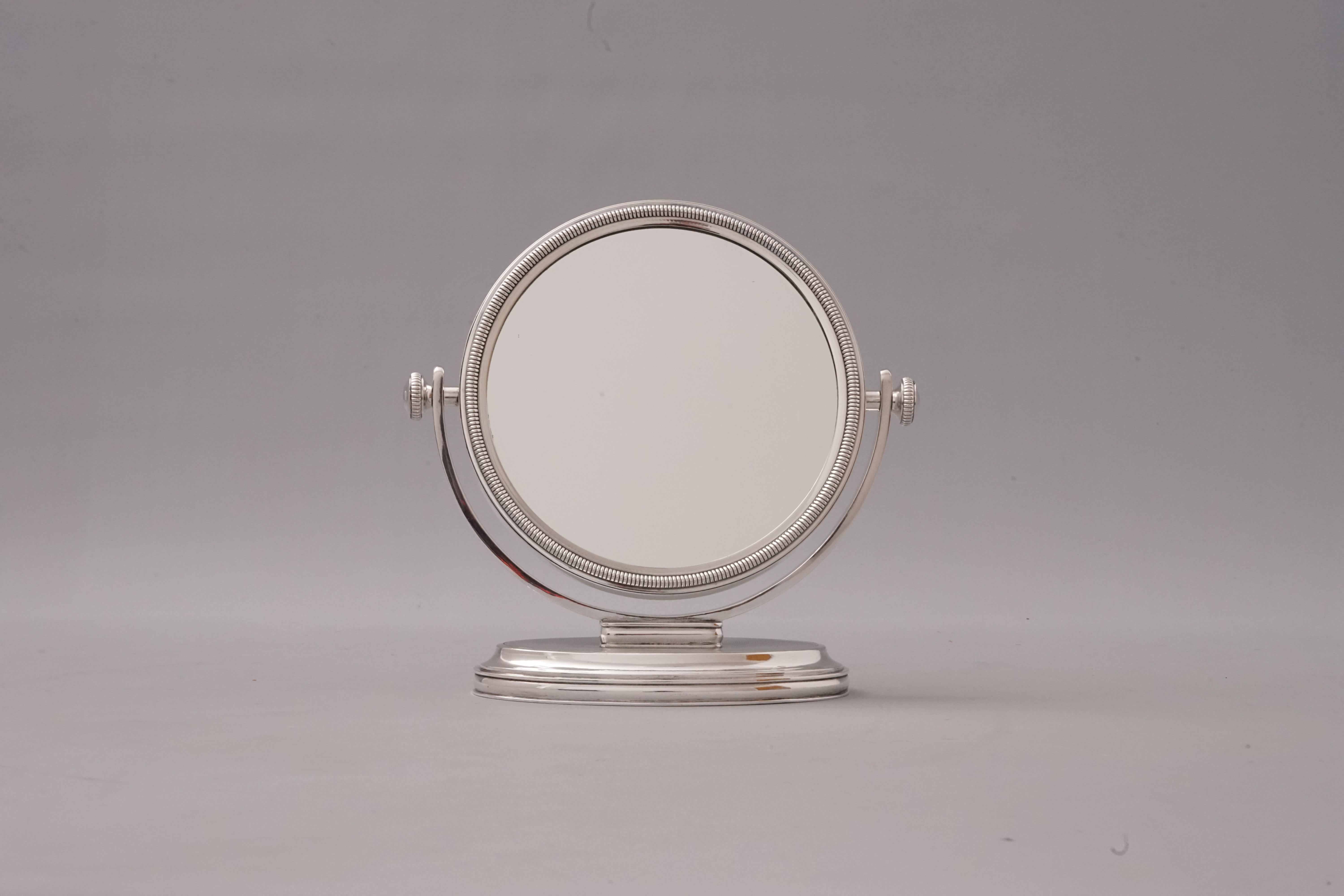Beautiful table mirror from the luxury fashion house Hermès Paris. 

Double stamped on the bottom “Hermès Paris. All parts of the mirror with “silversmith hallmark” and “French Minerva Head” with a “1”.

The mirror is rotatable and has two