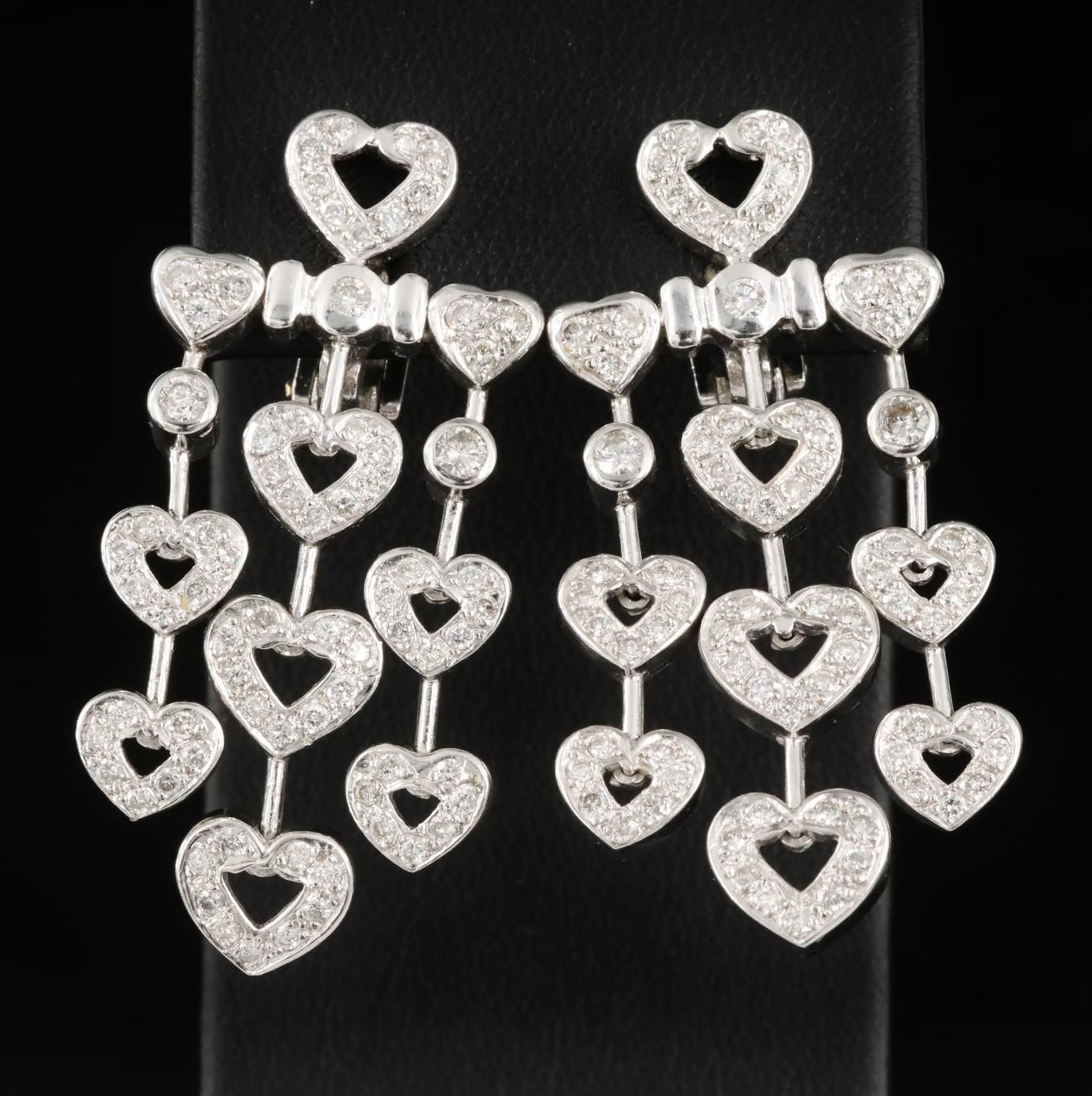 ITALY Designer Earrings

NEW with Tags, tag price $9500

2.65 CWT Diamond, SI Clarity / G white, high quality

18K solid White gold, stamped 18K

Heavy and well made, 24.7 grams 