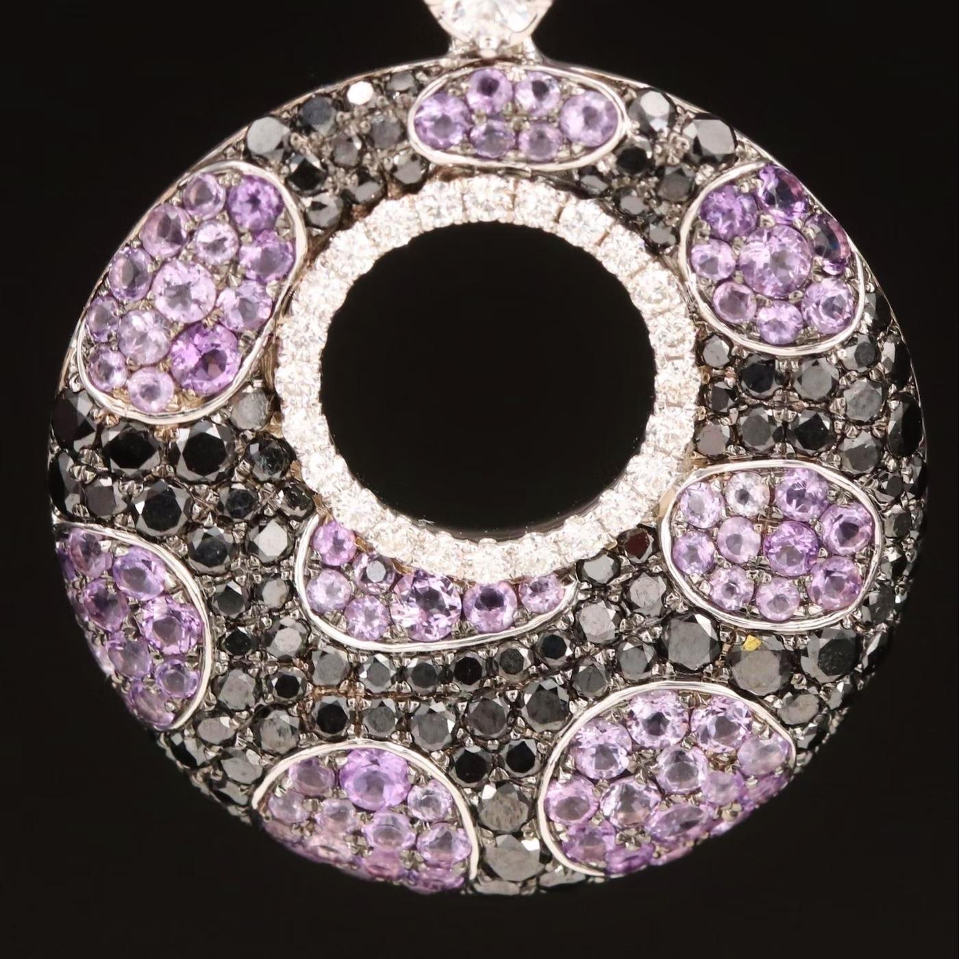 Designer EFFY necklace, fully hallmarked

Limited Edition red carpet item

NEW with tags, Tag price $9500

18K White gold, stamped 18K 

6.75 CT Diamond and Amethyst, Animal Print arrangement 
          - 3.25 CT Black Diamond
          - 0.5 CT