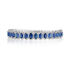 9.50ct Oval Sapphire & Round Diamond Bangle in 14KT Gold