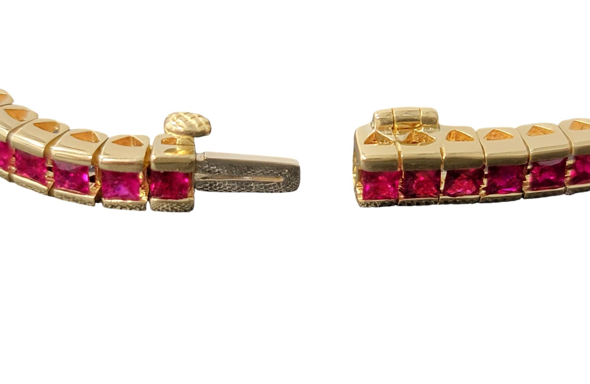 9.52 Carat Princess Cut Ruby Channel Set Tennis Bracelet in 18 Karat Yellow Gold In Good Condition For Sale In Scottsdale, AZ