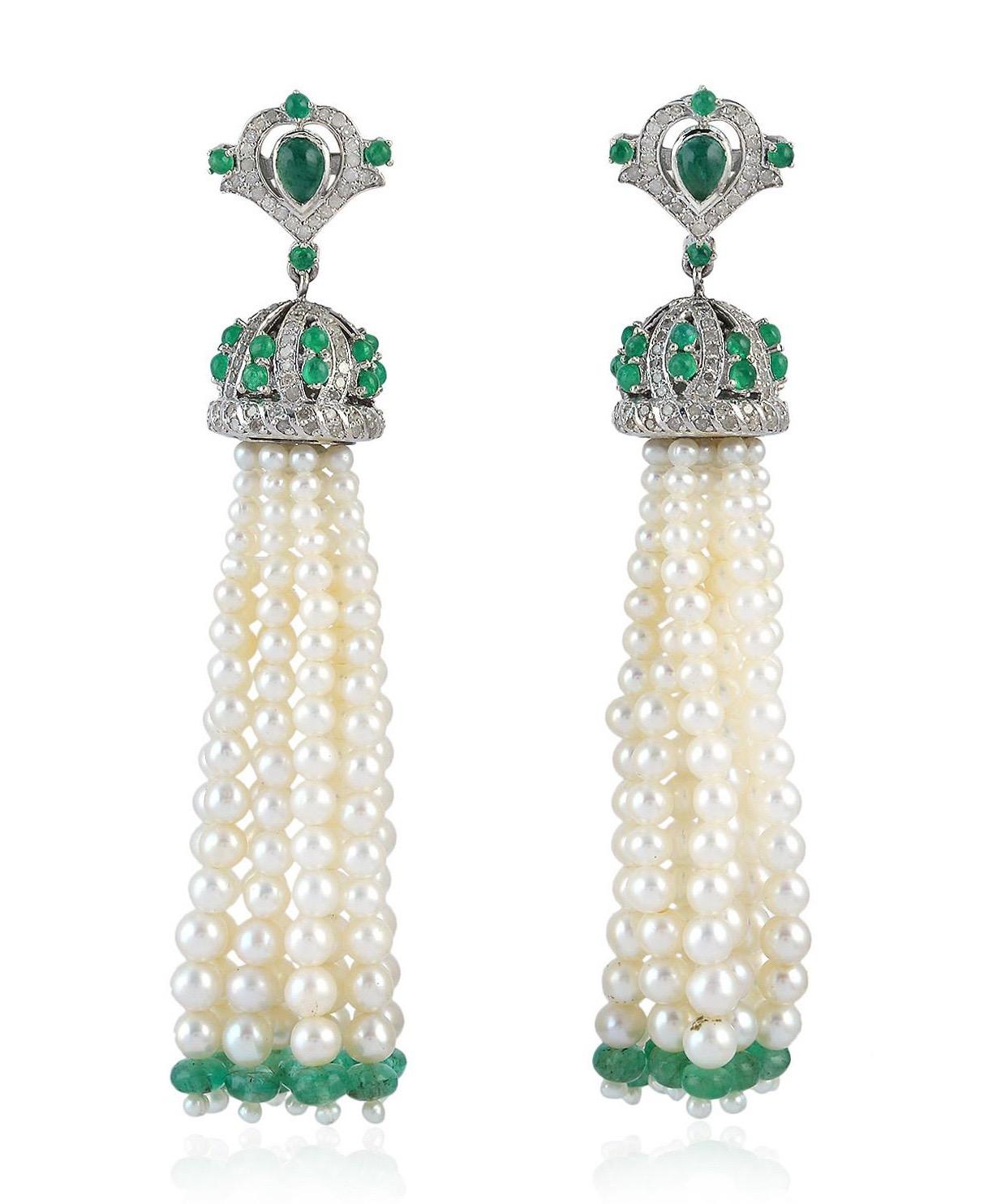 These stunning tassel earrings is handmade in 18-karat gold and sterling silver.  It is set in 68.25 carats pearl, 9.53 carats emerald and 1.5 carats of glittering diamonds. 

FOLLOW  MEGHNA JEWELS storefront to view the latest collection &