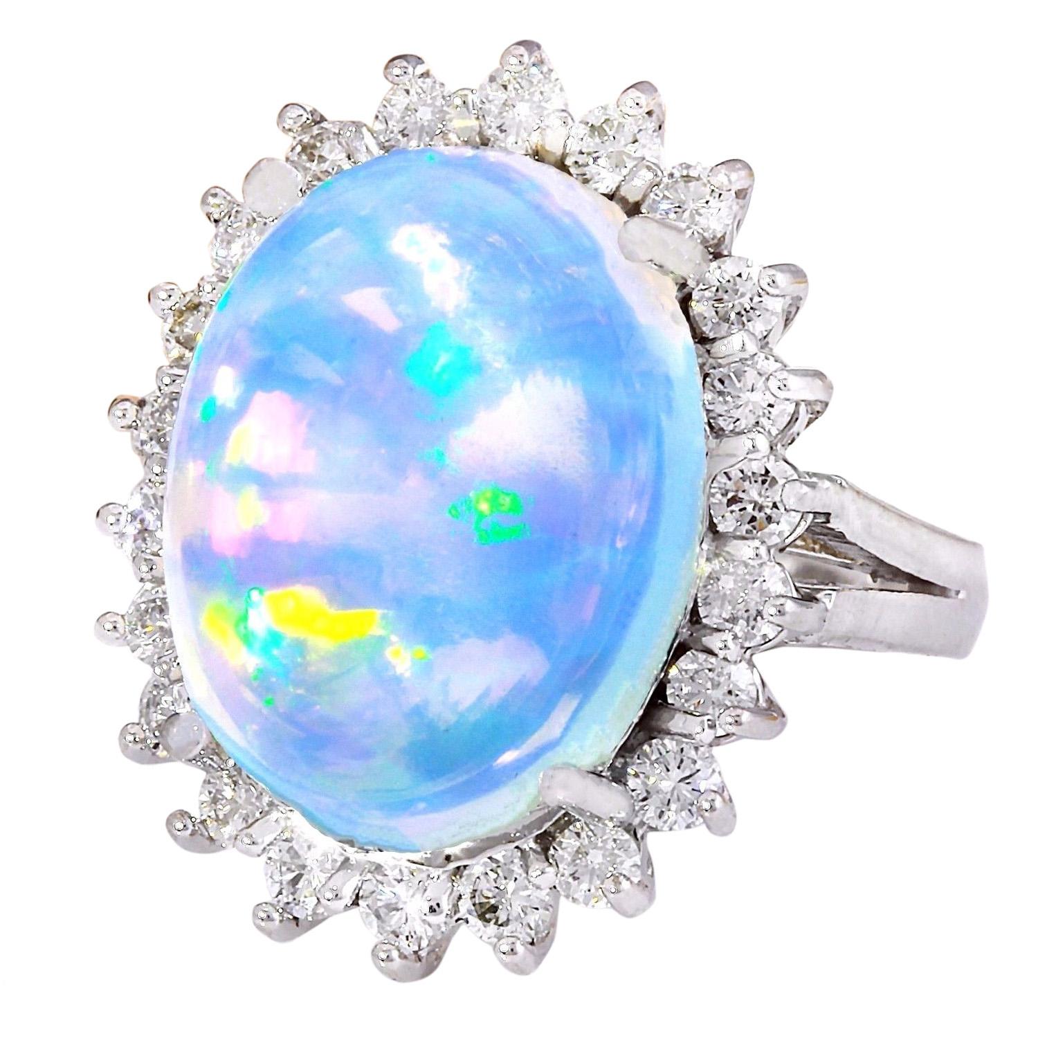 9.53 Carat Natural Opal 14K Solid White Gold Diamond Ring
 Item Type: Ring
 Item Style: Cocktail
 Material: 14K White Gold
 Mainstone: Opal
 Stone Color: Multicolor
 Stone Weight: 8.53 Carat
 Stone Shape: Oval
 Stone Quantity: 1
 Stone Dimensions: