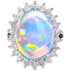 Bague en or blanc massif 14 carats avec opale naturelle et diamants