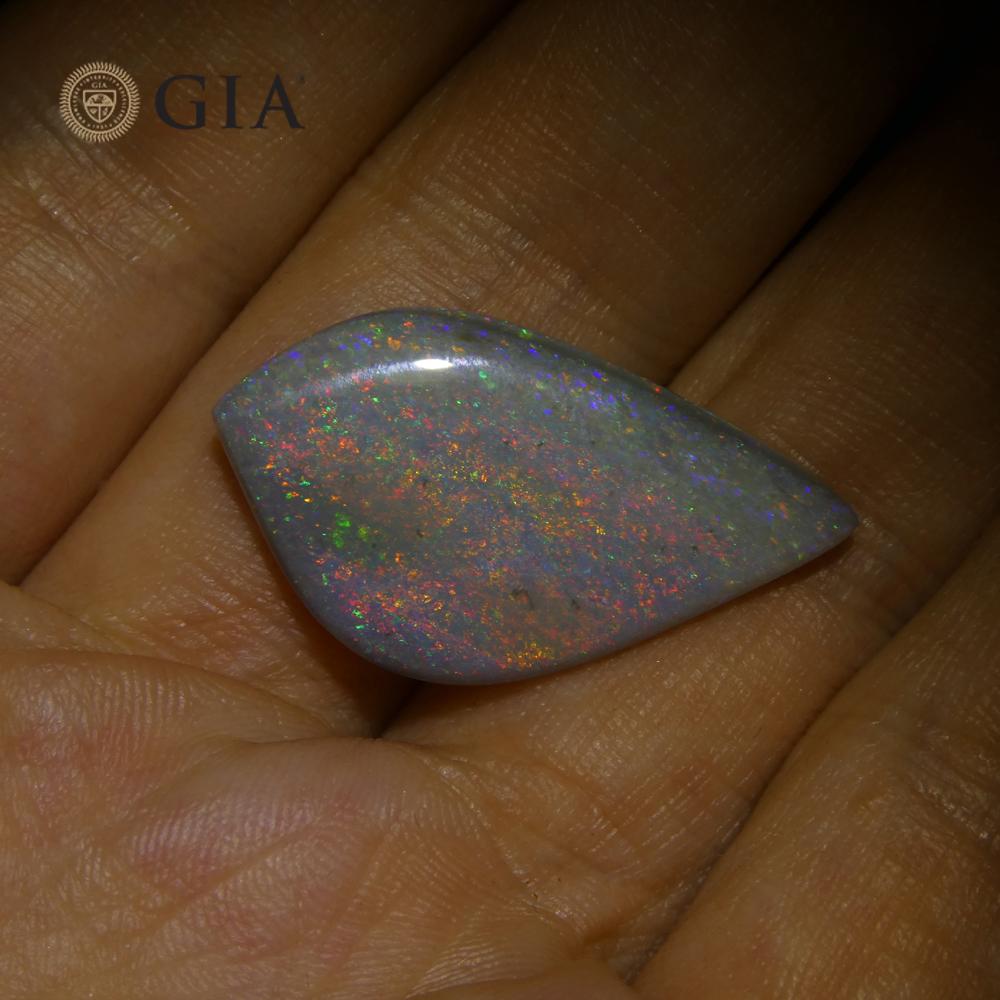 This is a stunning GIA Certified Opal


The GIA report reads as follows:

GIA Report Number: 5221841141
Shape: Freeform Carving
Cutting Style:
Cutting Style: Crown:
Cutting Style: Pavilion:
Transparency: Translucent
Color: Gray


RESULTS
Species: