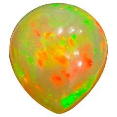 9.55 Ct Ethiopian Pear Shape Fire Opal Cabochon Gem with Vibrant Play of Colors