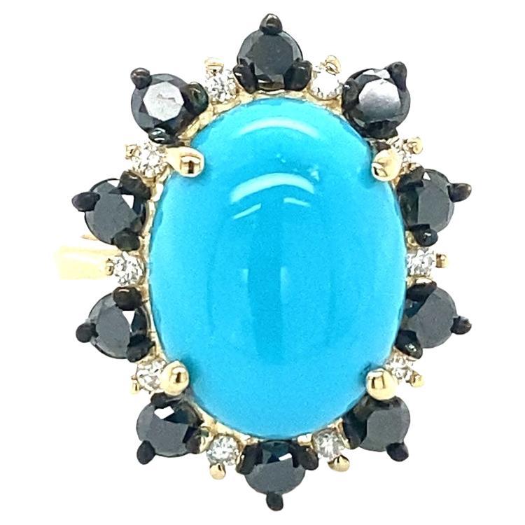 Un bijou unique .....9.56 Carat Turquoise Black and White Diamond Yellow Gold Cocktail Ring

Cette bague comporte une turquoise ovale de 7,93 carats entourée de 10 diamants ronds pesant 0,19 carats (pureté : SI2, couleur : F) et de 10 diamants noirs