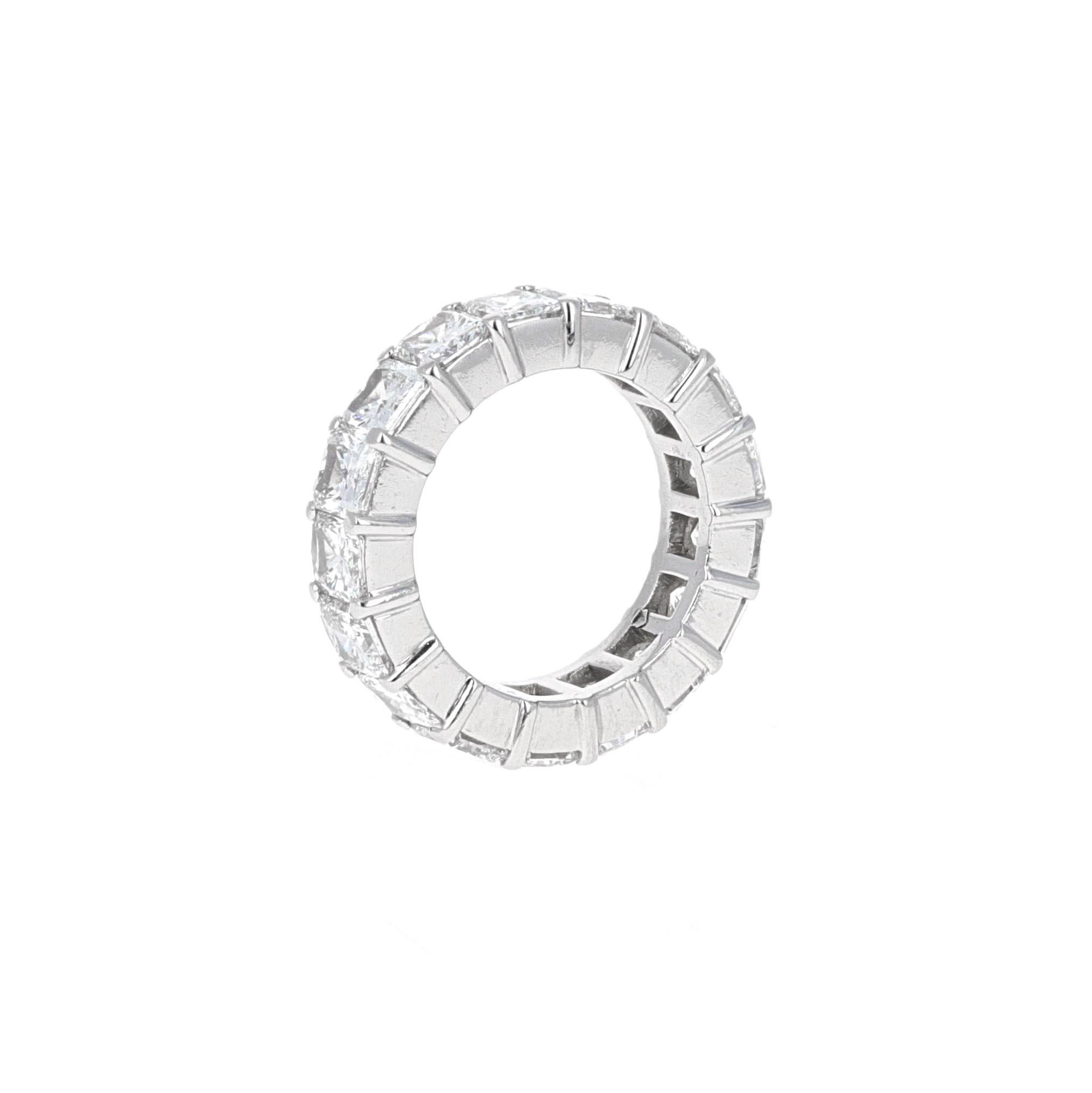 Hand Made platinum elongated radiant cut diamond eternity band. There are a total of 17 stones weighing a total of 9.57 carats. Each diamond weighs over 0.50 carats and is estimated to be F/G in color and VS clarity. All 17 stones match perfectly in