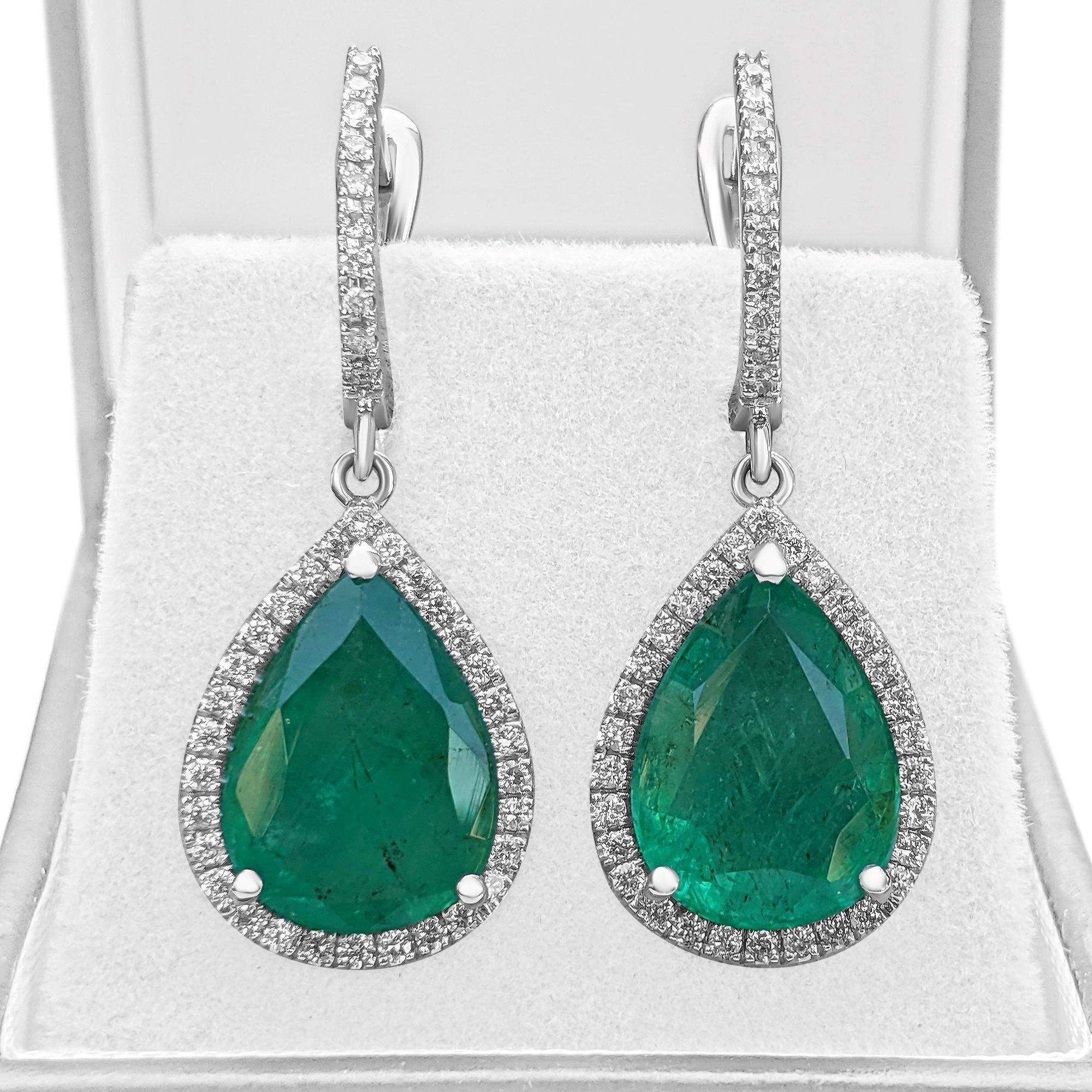 Excellent Quality Natural oval shaped emerald and diamond earrings with green color and excellent luster, adorned by high quality natural diamonds. 

Center Stone:
___________
Natural Emerald
Cut: Pear Mixed Cut
Carat: 9.57 tcw / 2 pieces
Color: