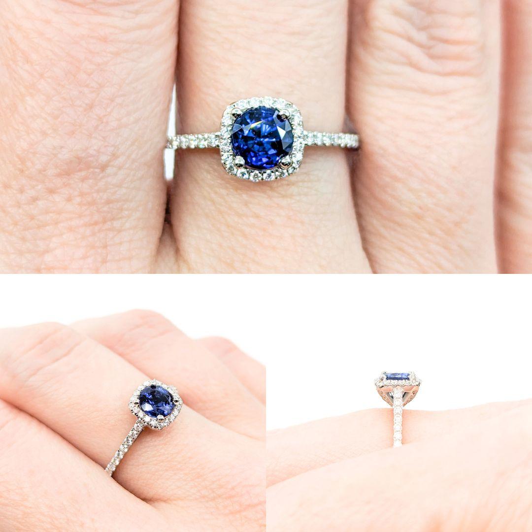 .95ct Sapphire & Diamond Halo Ring in White Gold

Introducing this beautiful non-traditional engagement ring crafted in 14kt white gold. The ring features a stunning .95ct blue sapphire centerpiece, symbolizing September's birthstone known for its